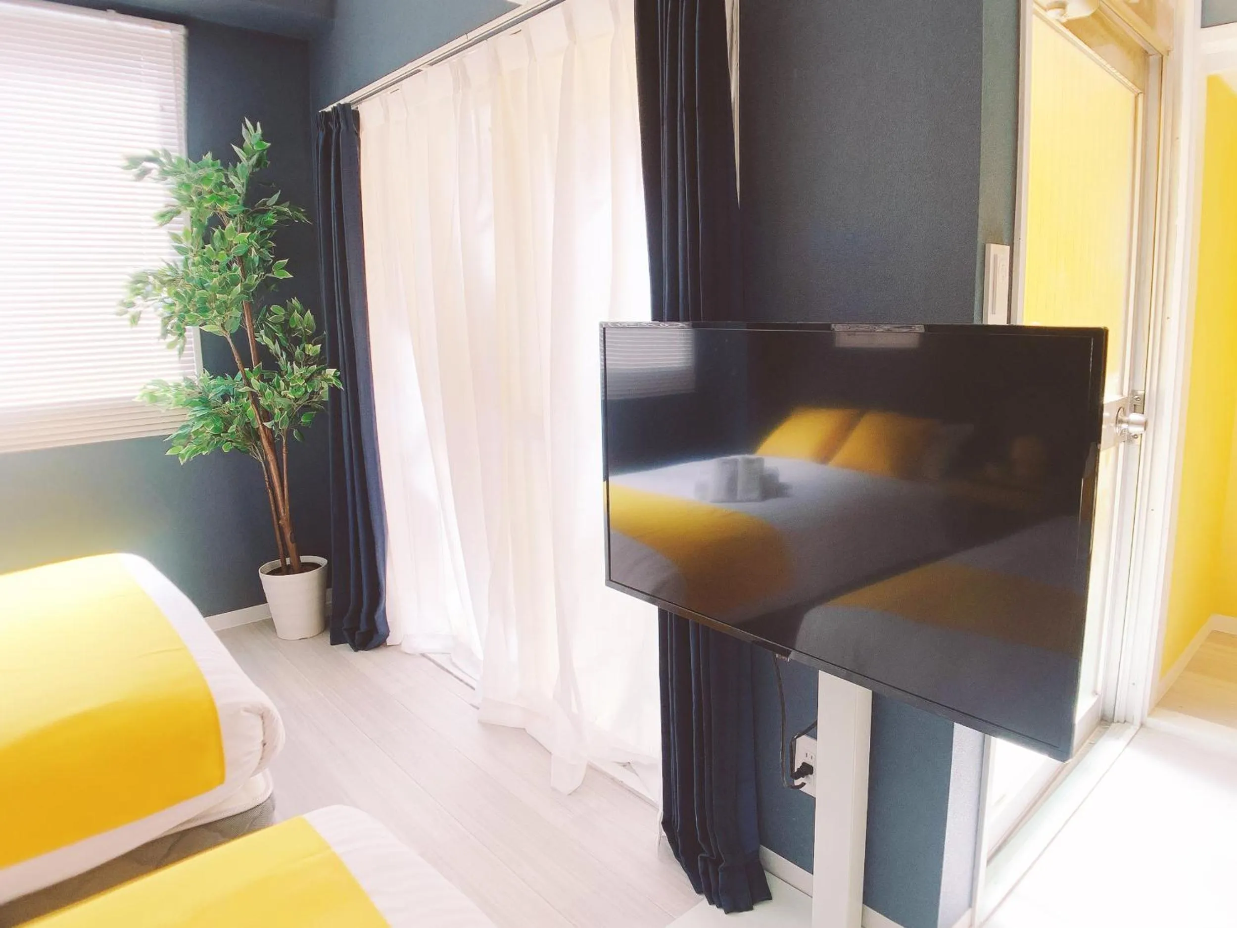 Bed in OUCHI HOTEL Nagarekawa with Dogs