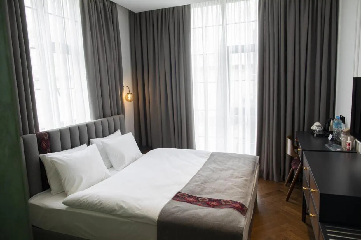 Bed in Molokan Inn Hotel