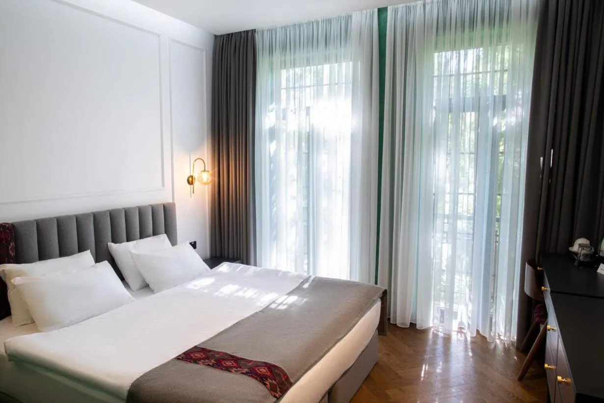 Bed in Molokan Inn Hotel