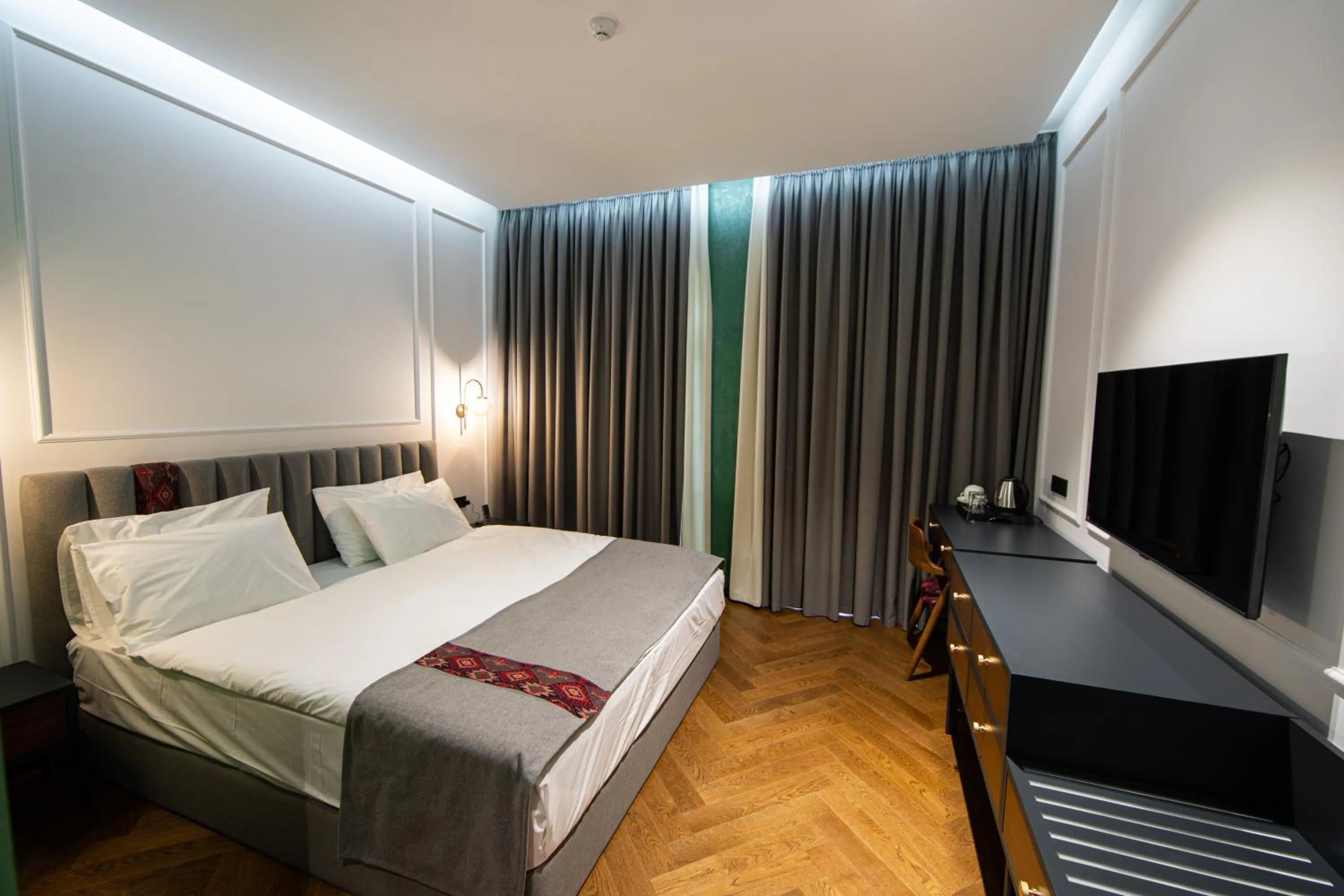 Bed in Molokan Inn Hotel