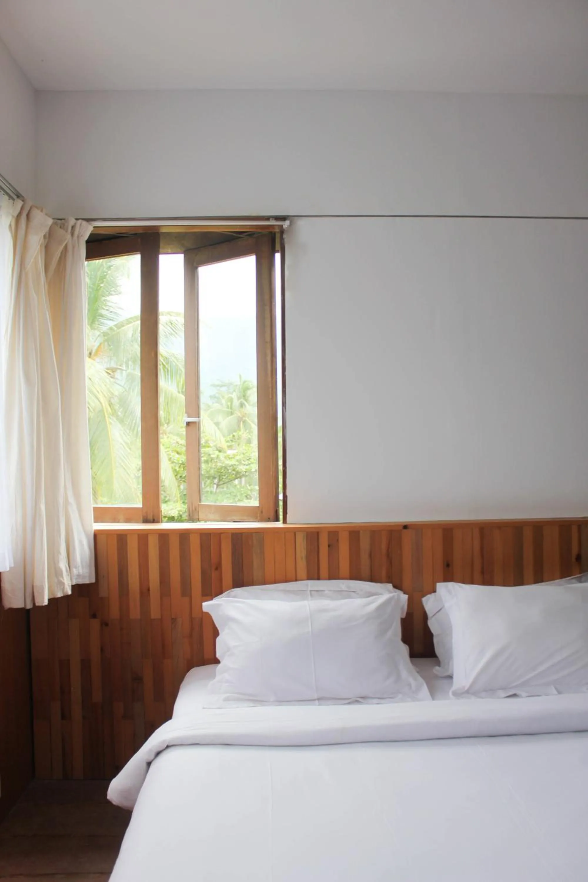 Bed in Natuna Dive Resort