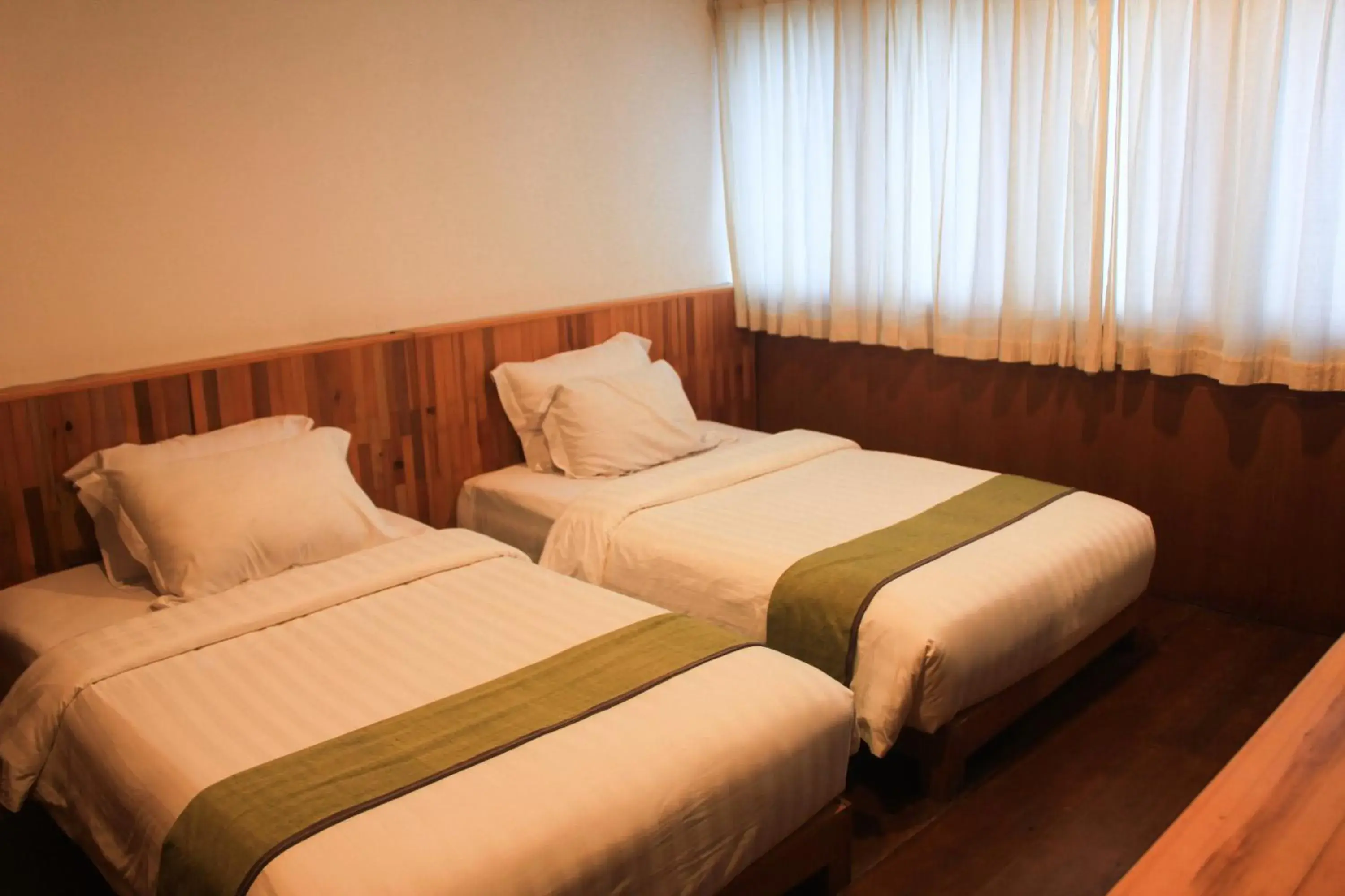 Bed in Natuna Dive Resort Bed in Natuna Dive Resort