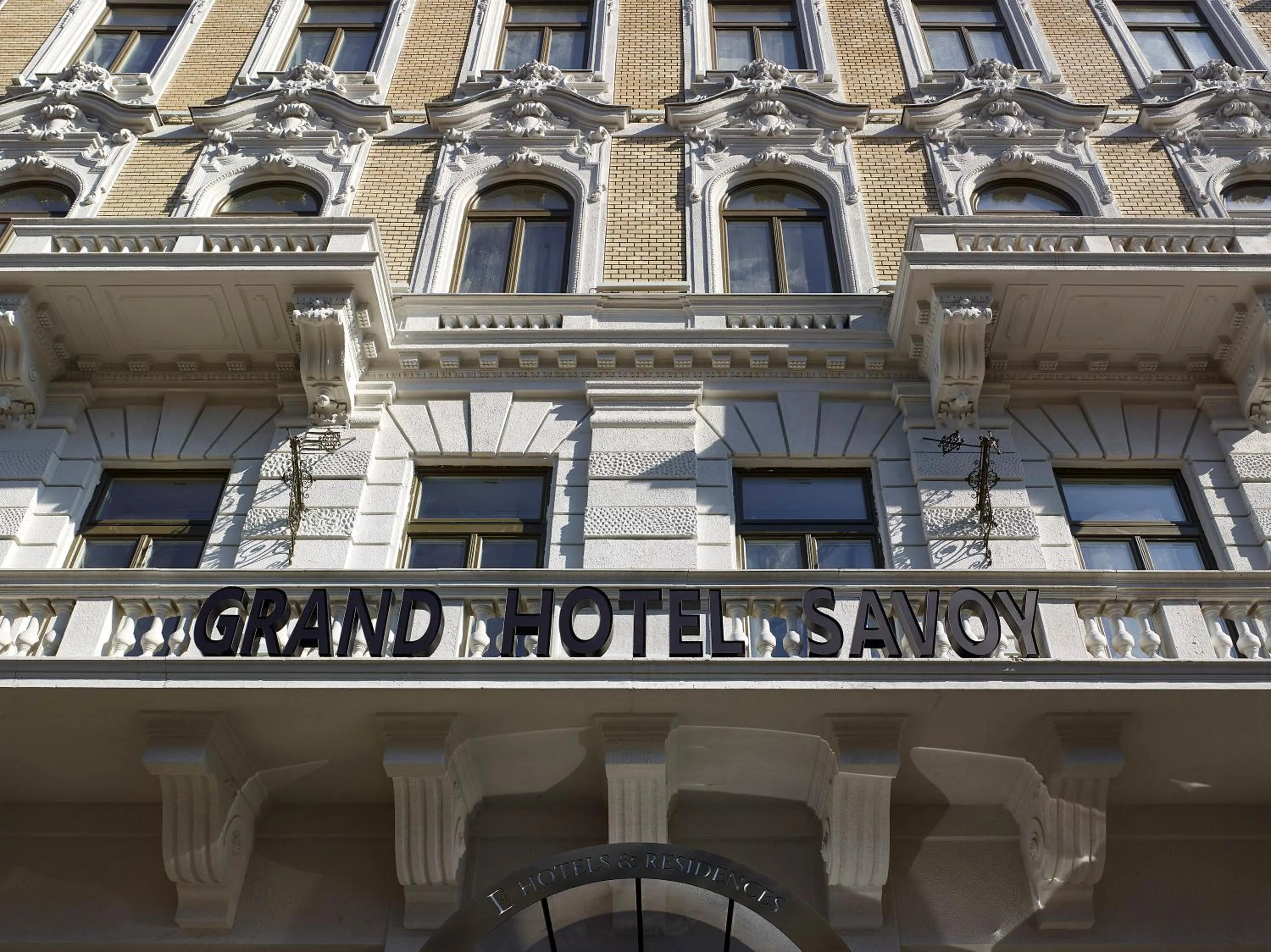 Property building in EST Grand Hotel Savoy