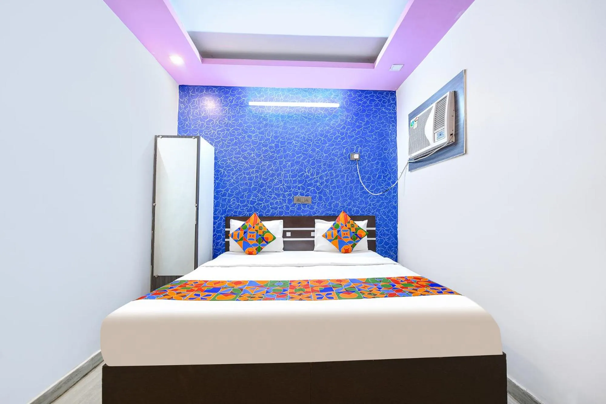 Bed in FabHotel Capital Inn