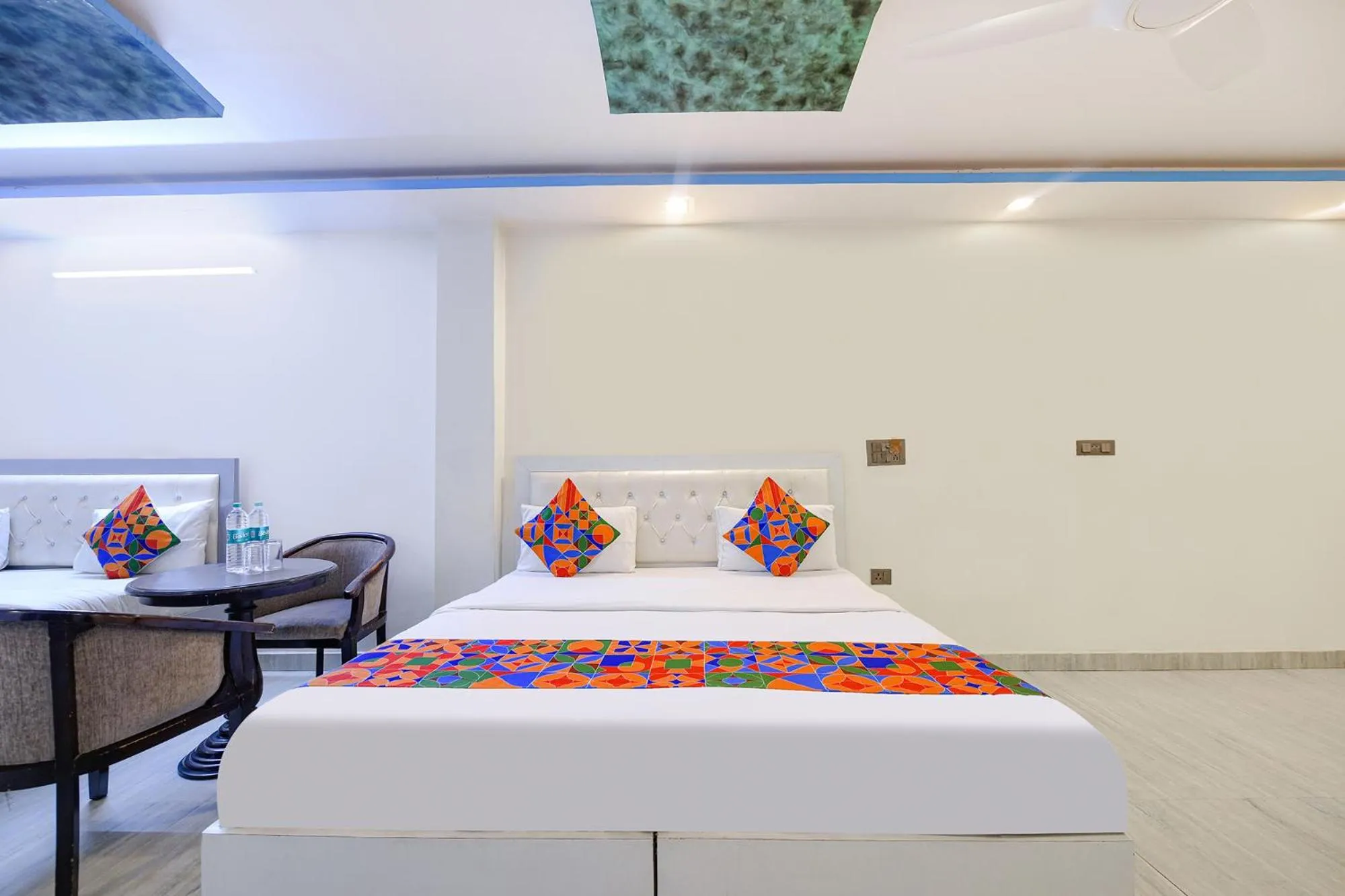 Bed in FabHotel Capital Inn