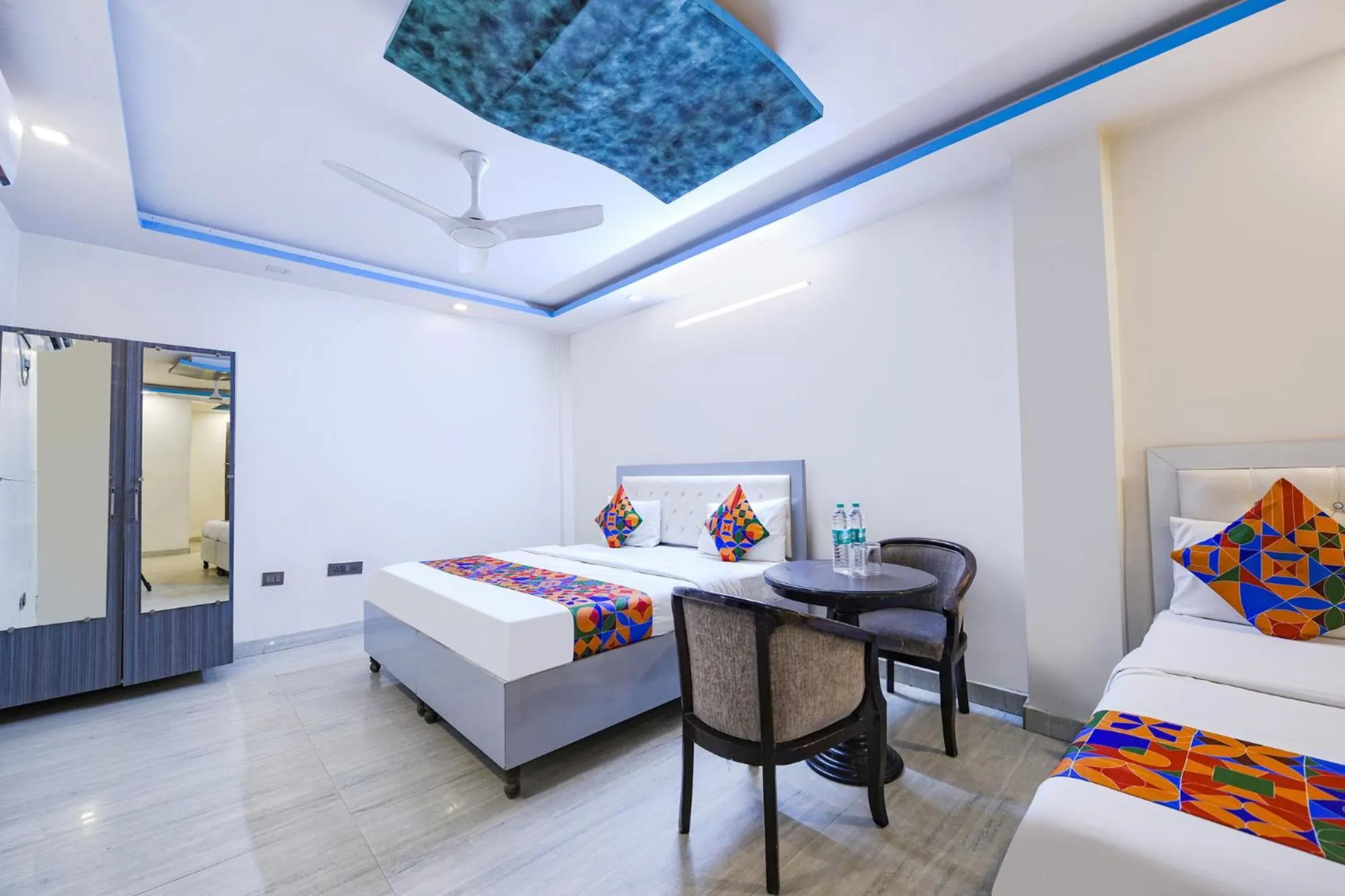 Bed in FabHotel Capital Inn