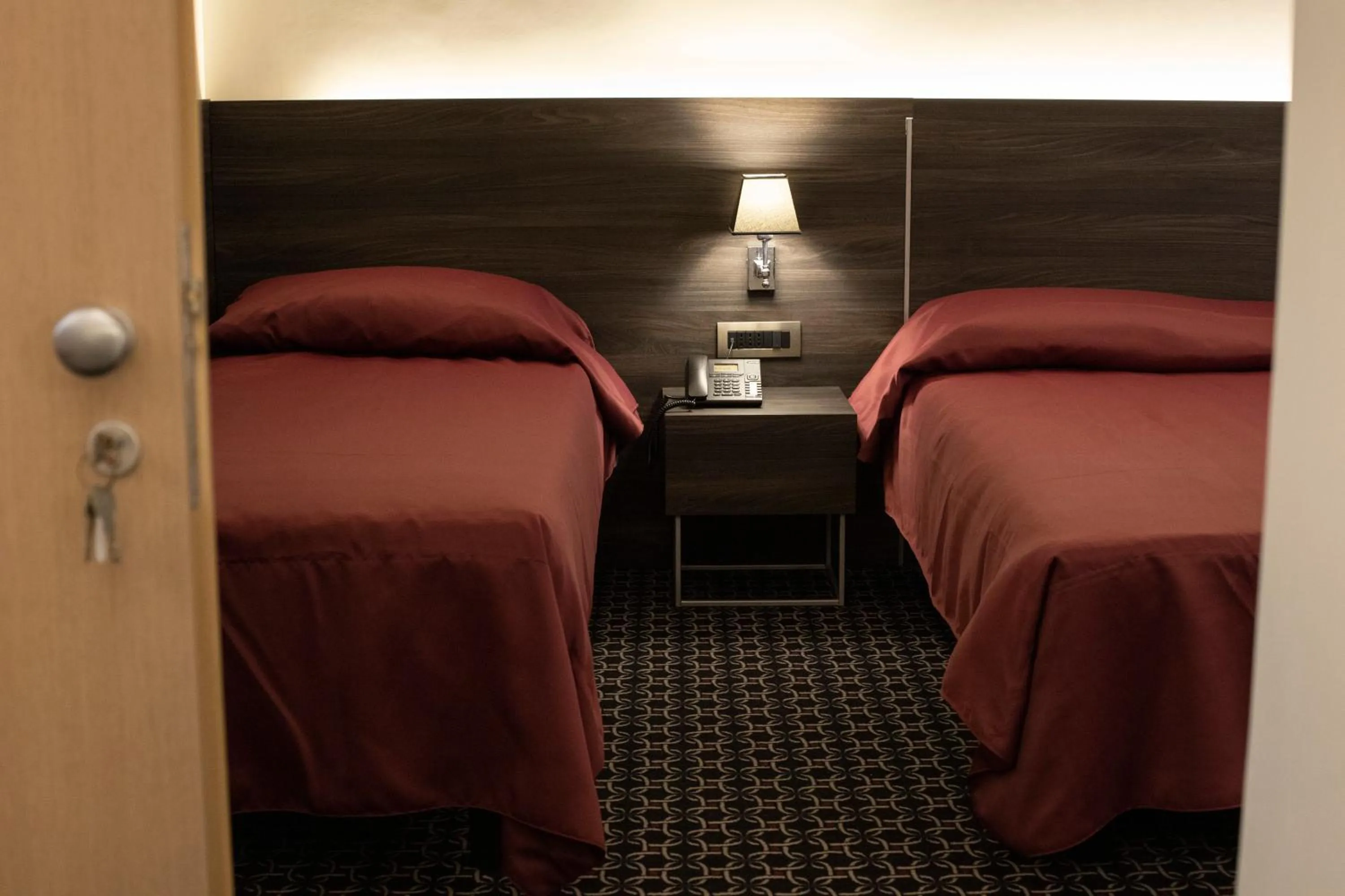 Bed in Gemelli Hotel