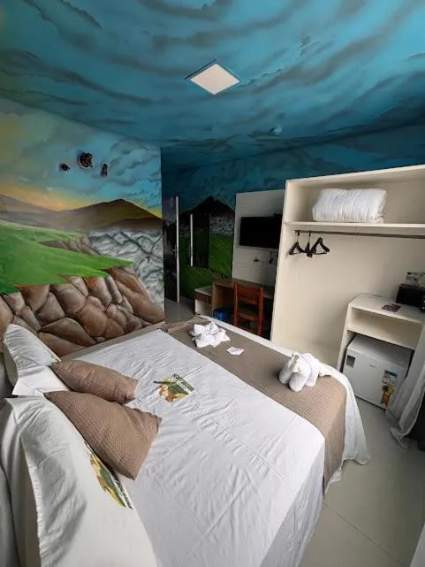 Bed in Hotel Recanto dos Dinossauros