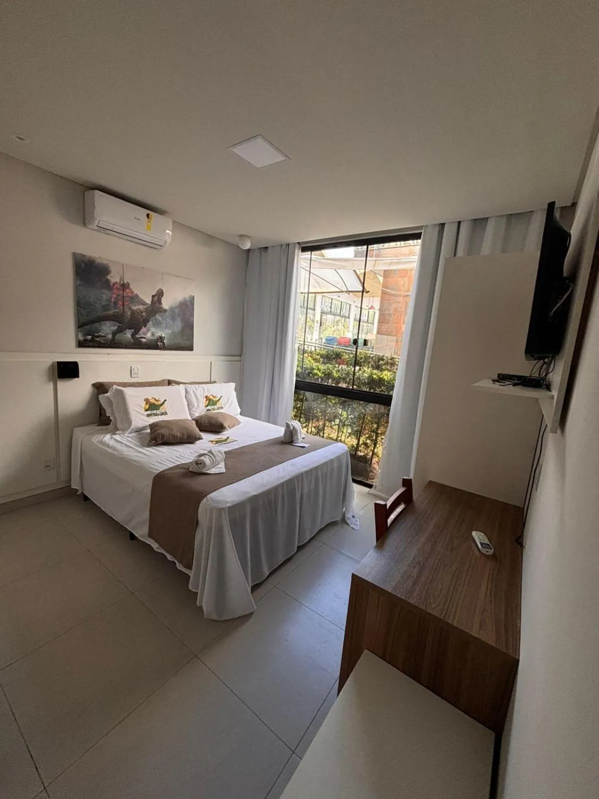 Bed in Hotel Recanto dos Dinossauros