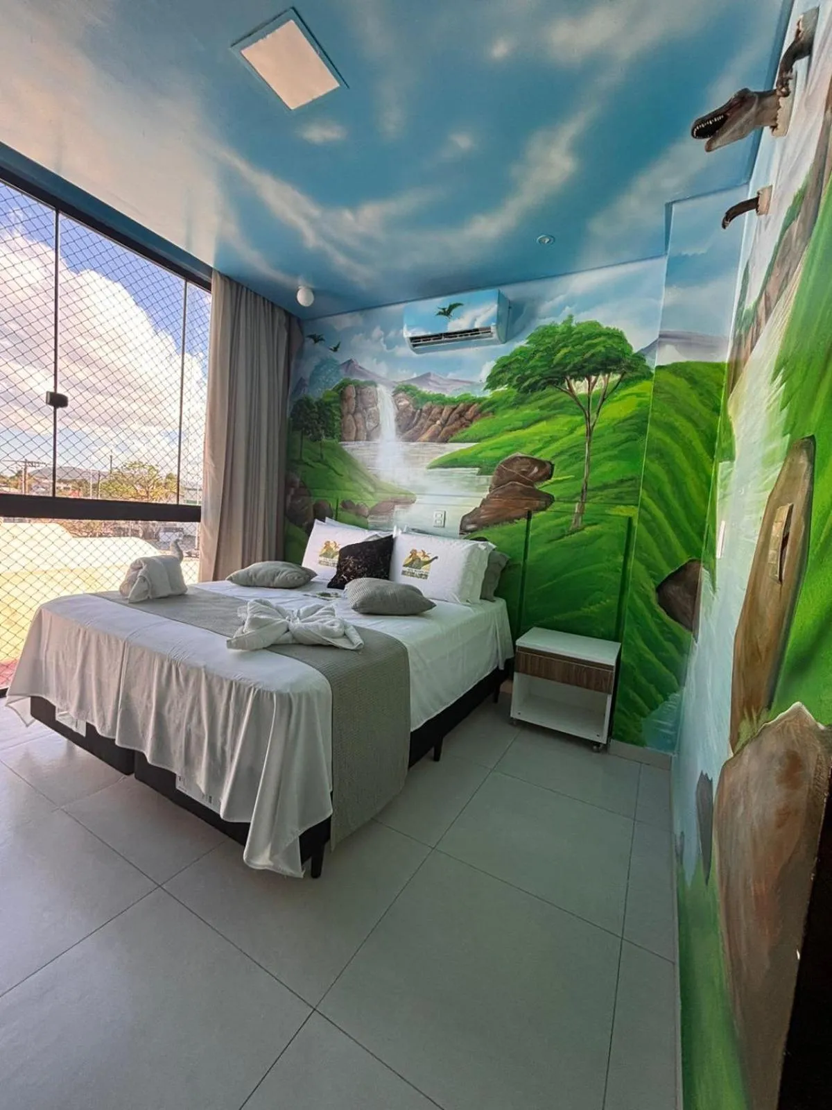 Bed in Hotel Recanto dos Dinossauros