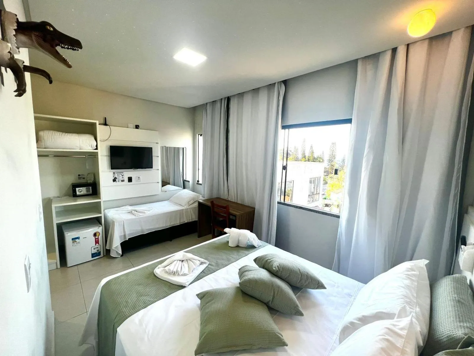 Bed in Hotel Recanto dos Dinossauros