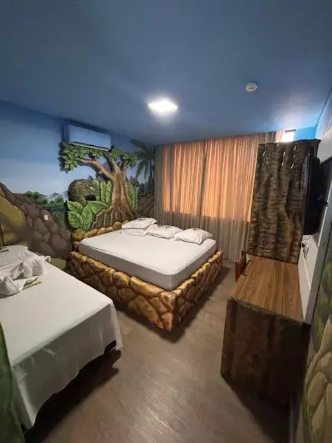 Deluxe Triple Room in Hotel Recanto dos Dinossauros Deluxe Triple Room in Hotel Recanto dos Dinossauros