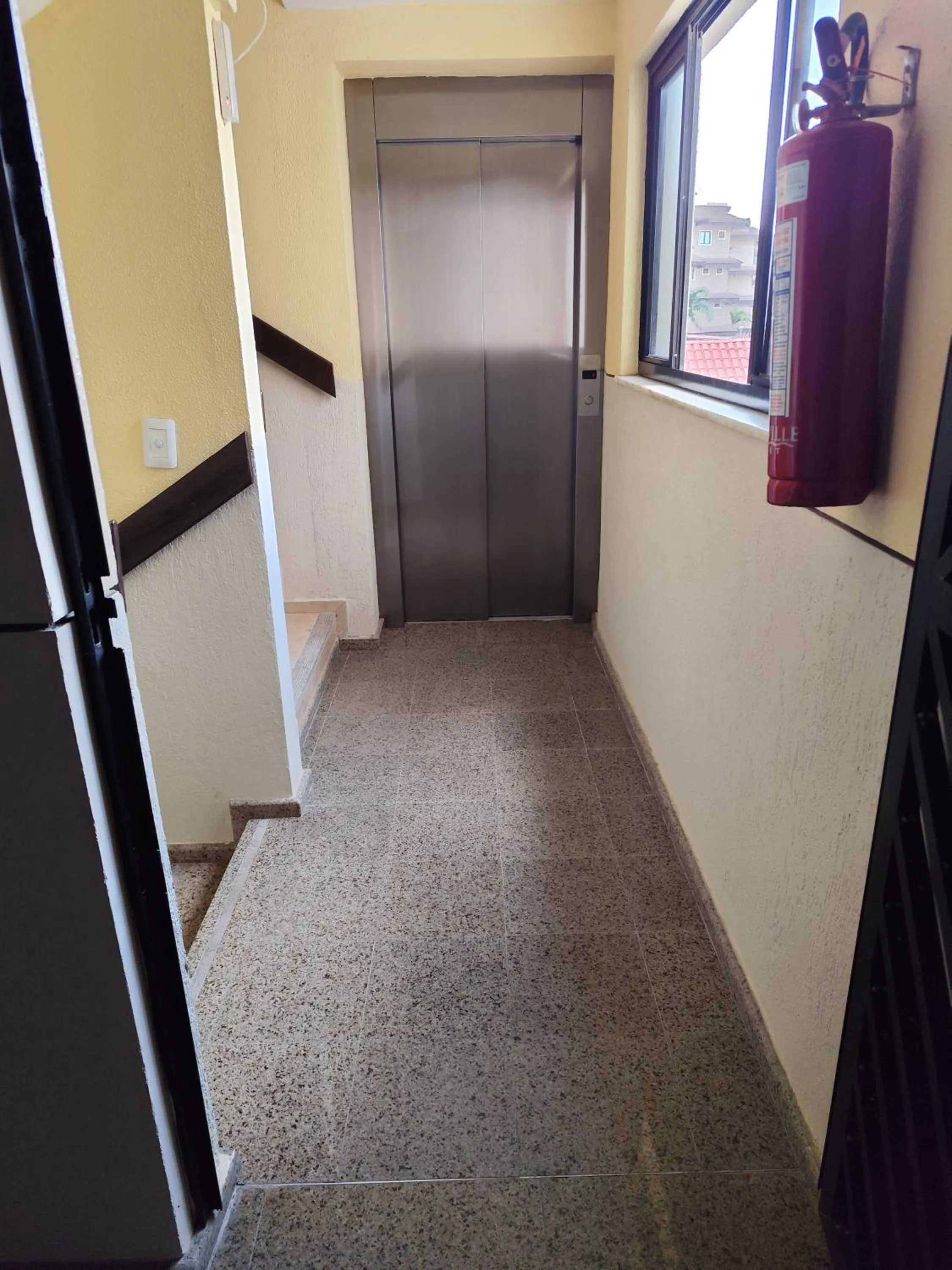 elevator in Apartamento Aquaville Pé na areia e Água coco