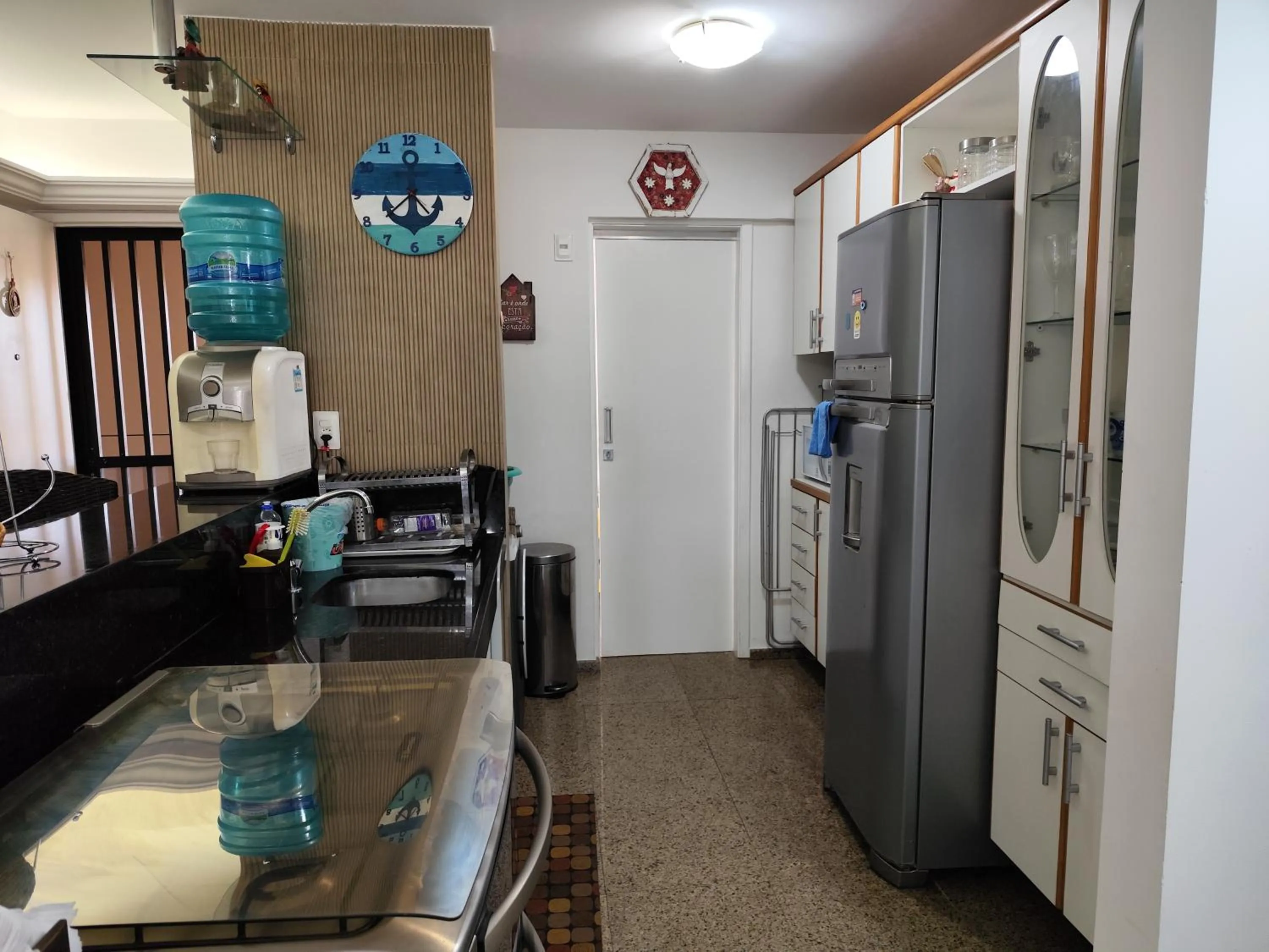 Communal kitchen in Apartamento Aquaville Pé na areia e Água coco