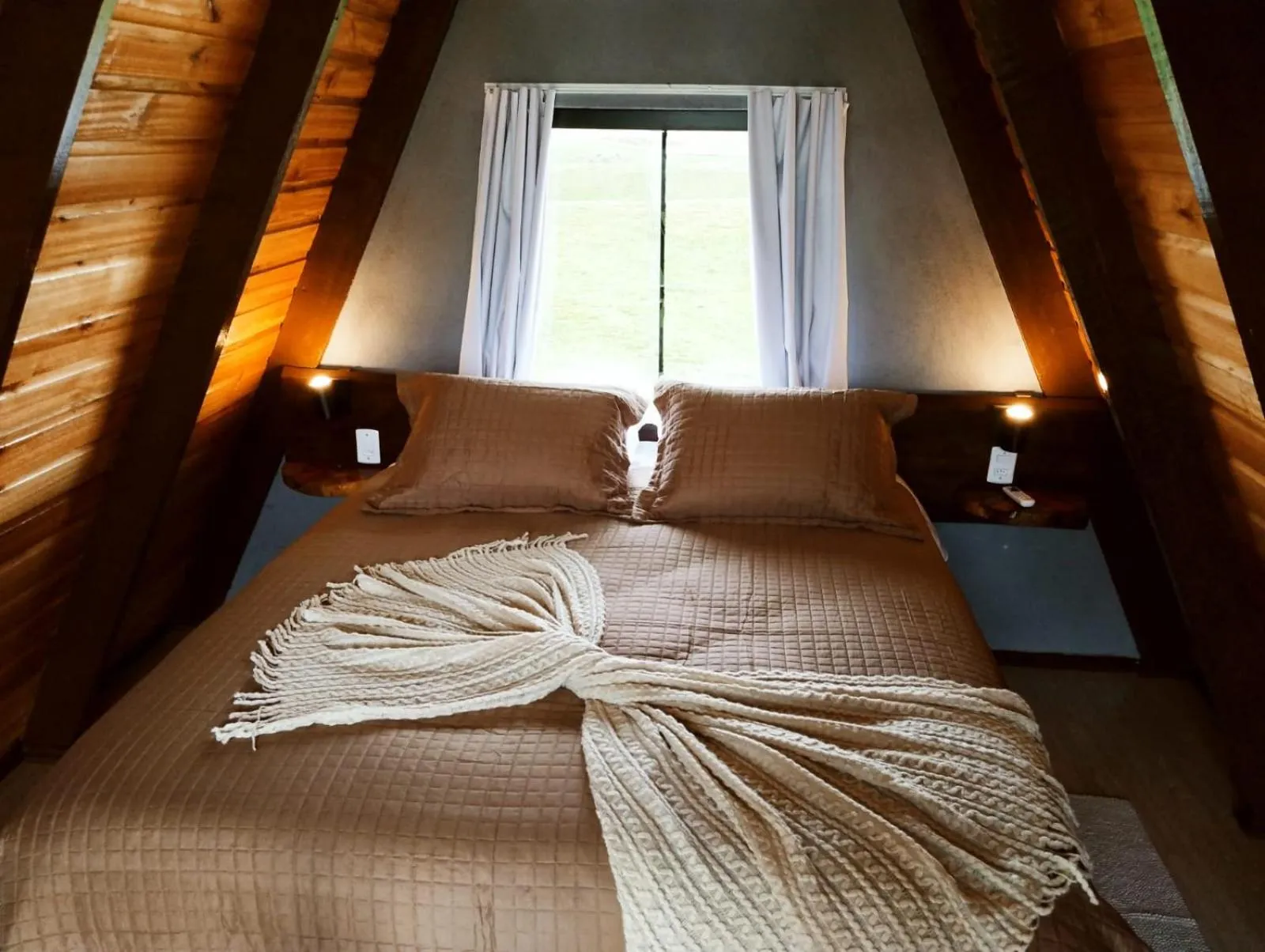 Bed in Chalés Corucacas