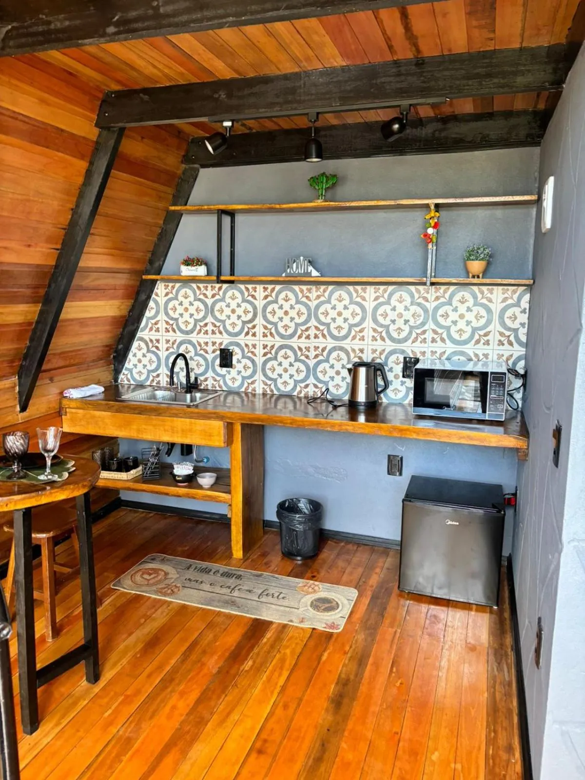 Kitchen or kitchenette in Chalés Corucacas