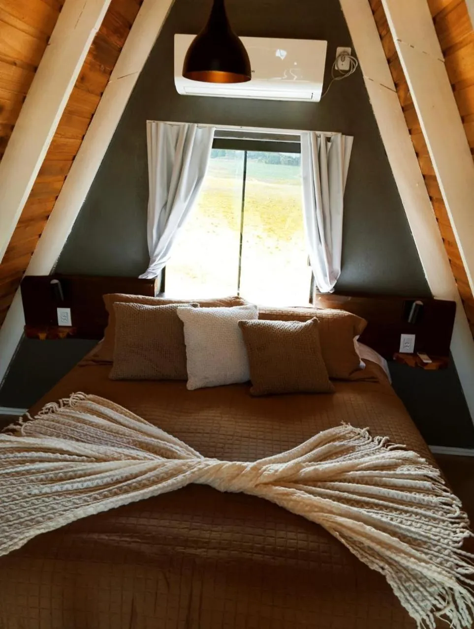 Bed in Chalés Corucacas