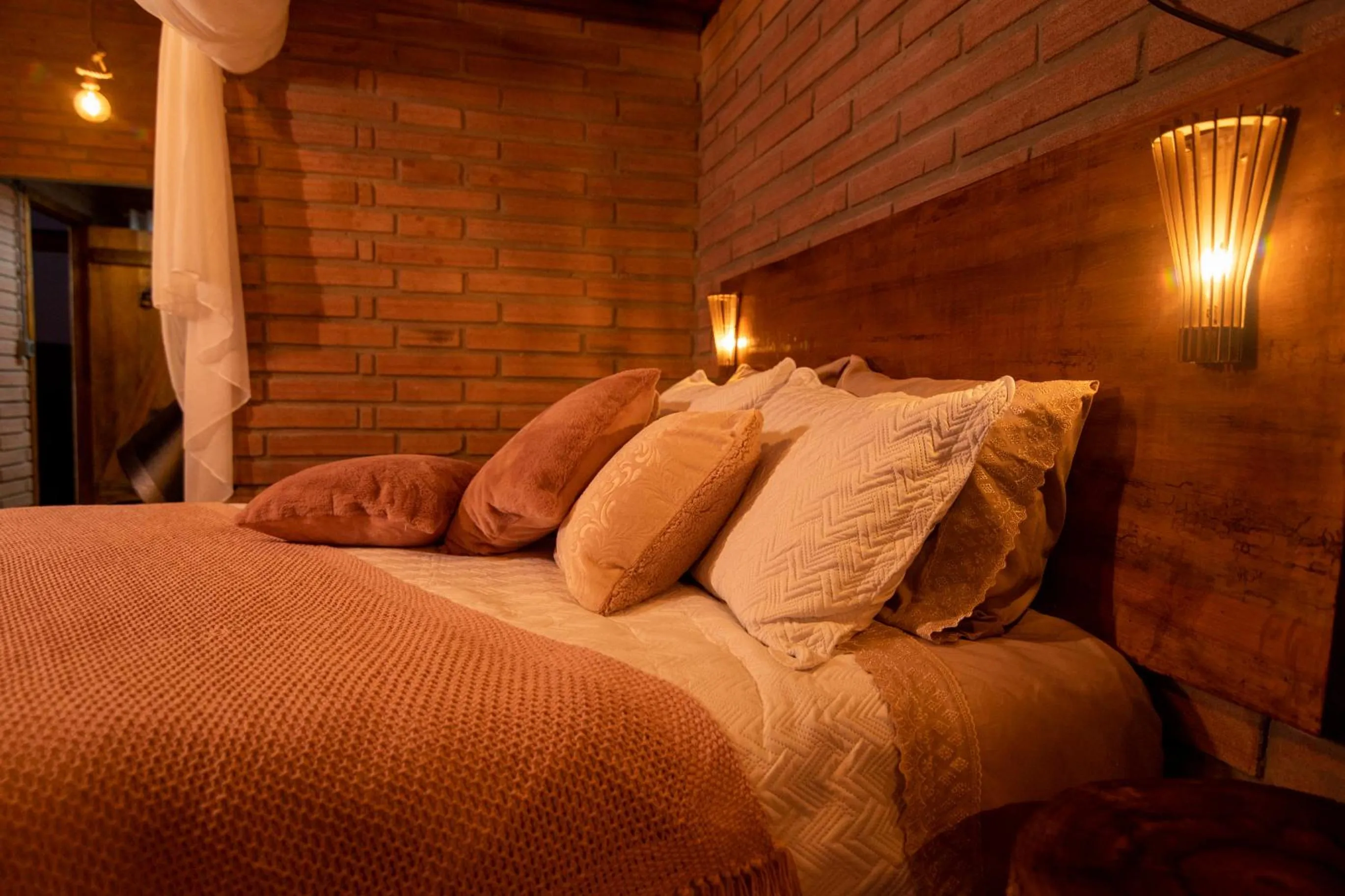 Bed in Chalés Corucacas