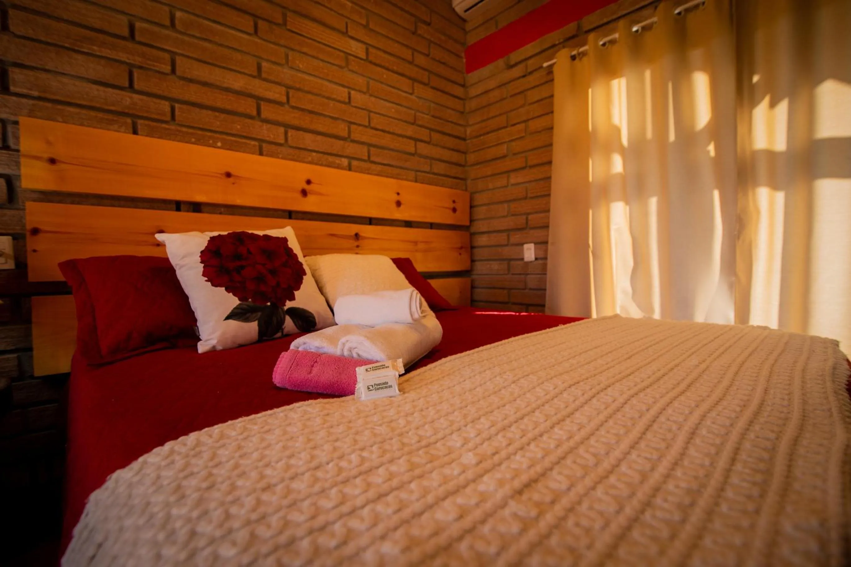 Bed in Chalés Corucacas