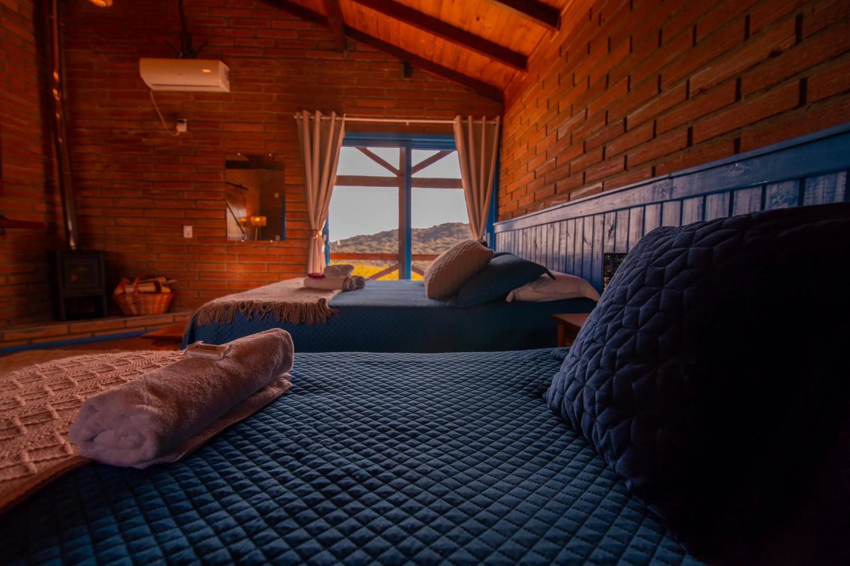 Bed in Chalés Corucacas