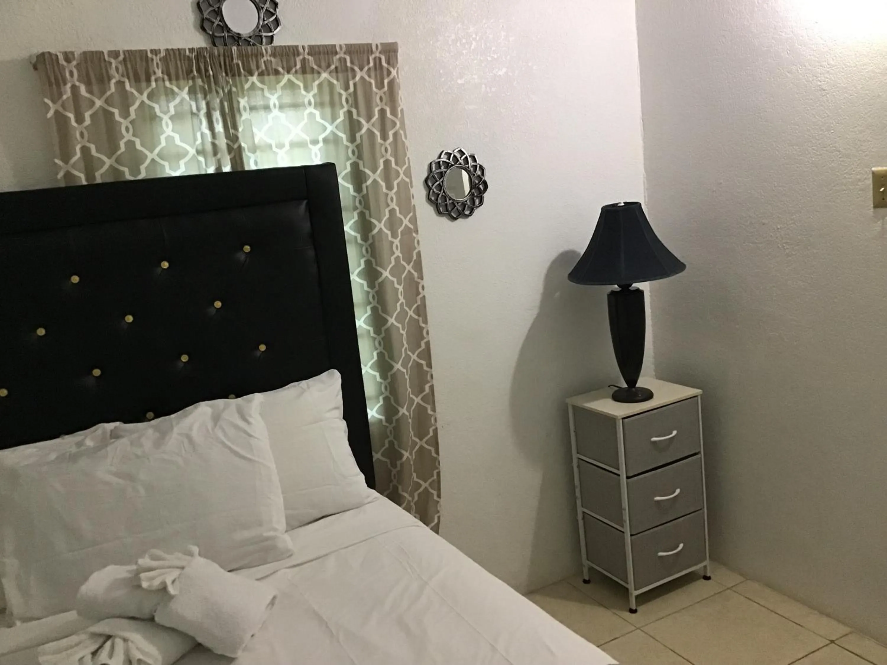 Bed in A taste of Jamaica Lavern’s Place