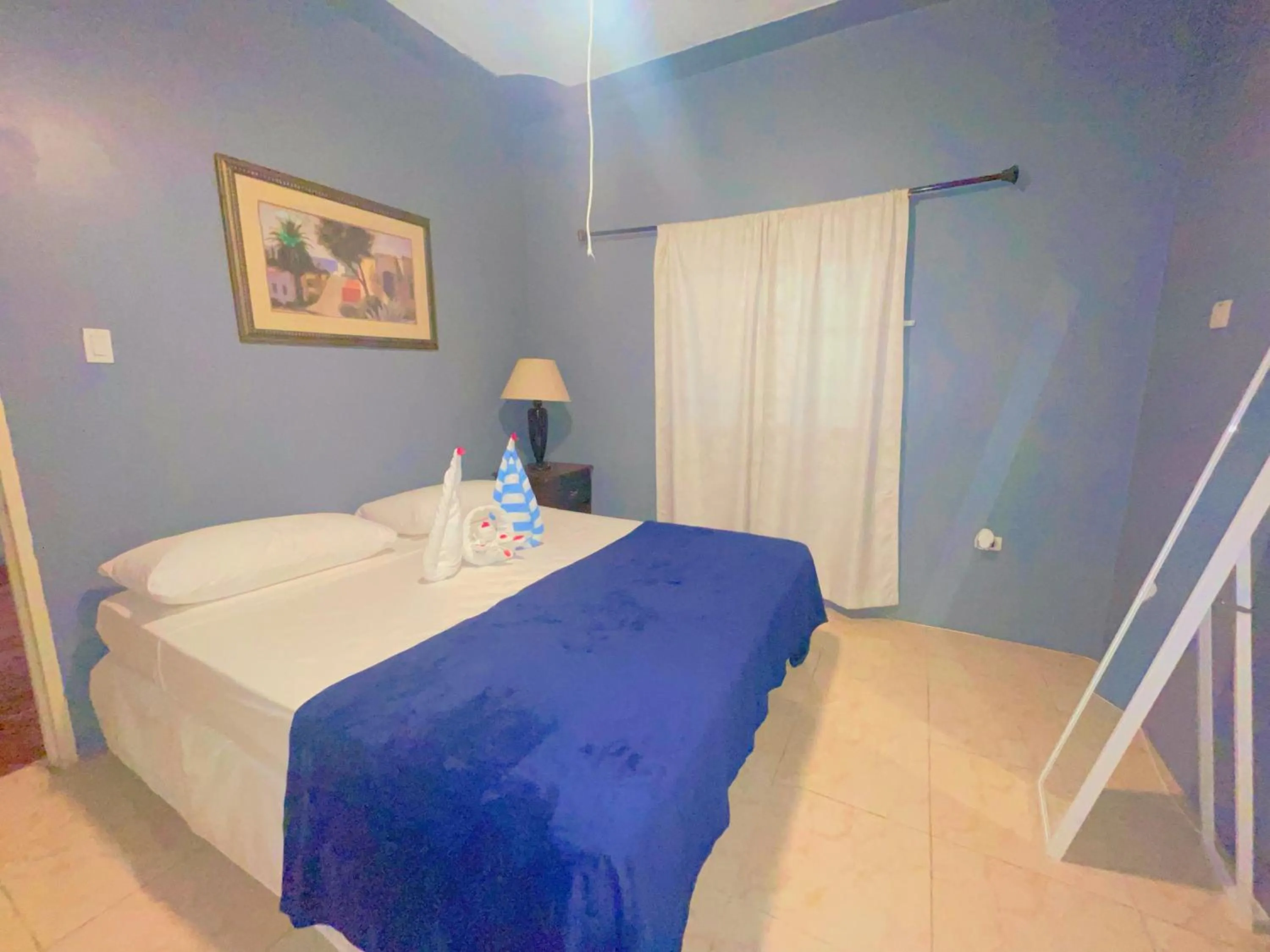 Bed in A taste of Jamaica Lavern’s Place