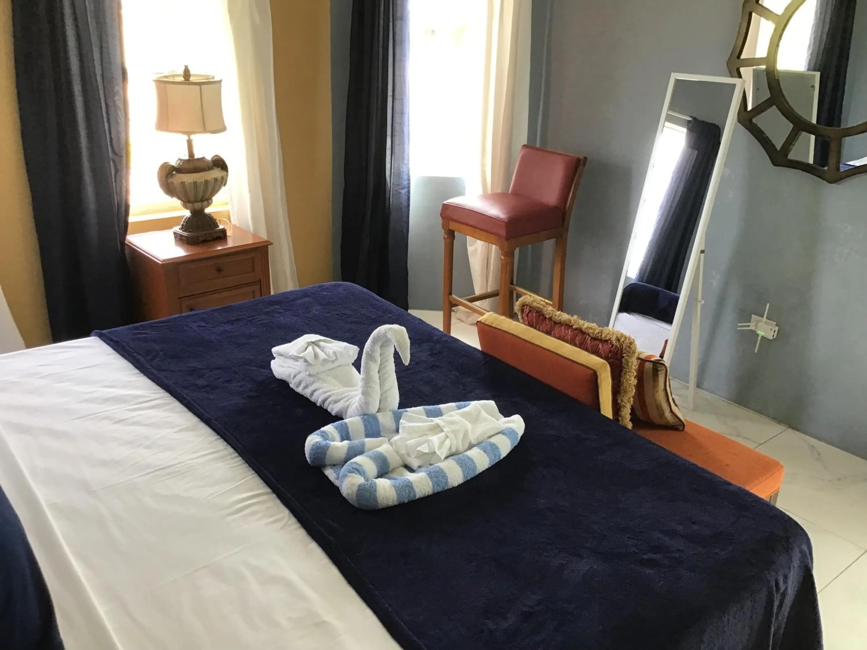 Bed in A taste of Jamaica Lavern’s Place