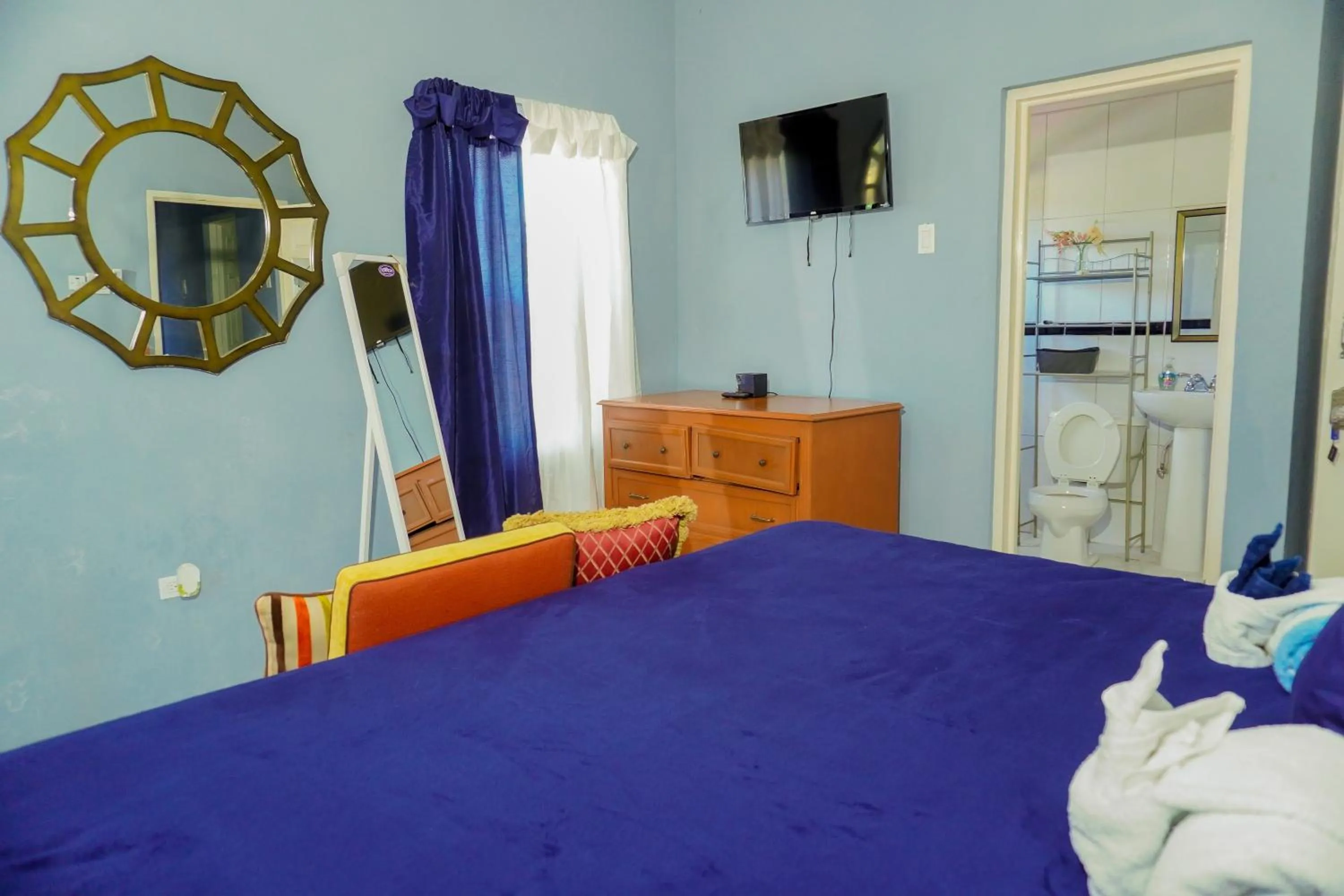 Bed in A taste of Jamaica Lavern’s Place