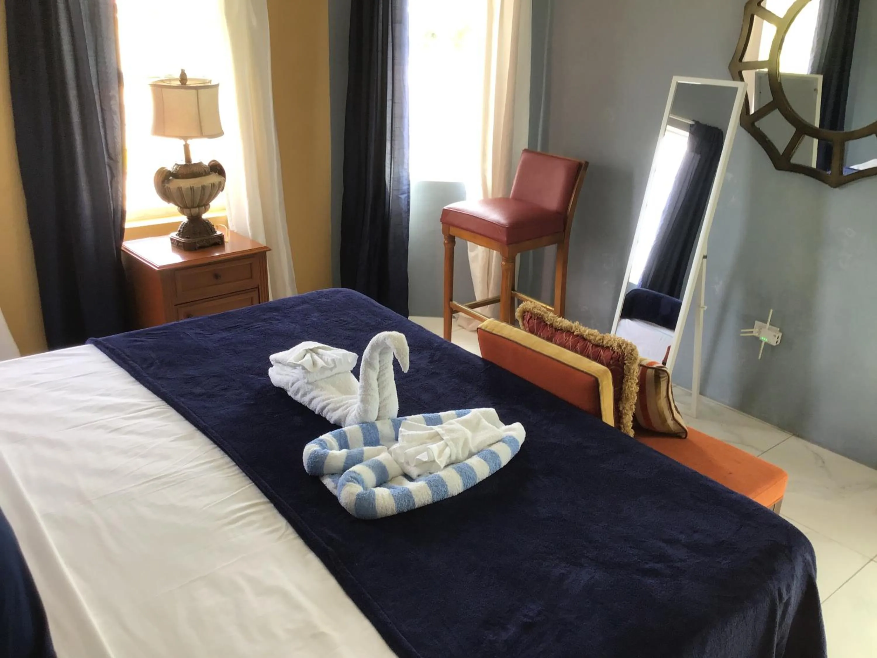 Bed in A taste of Jamaica Lavern’s Place