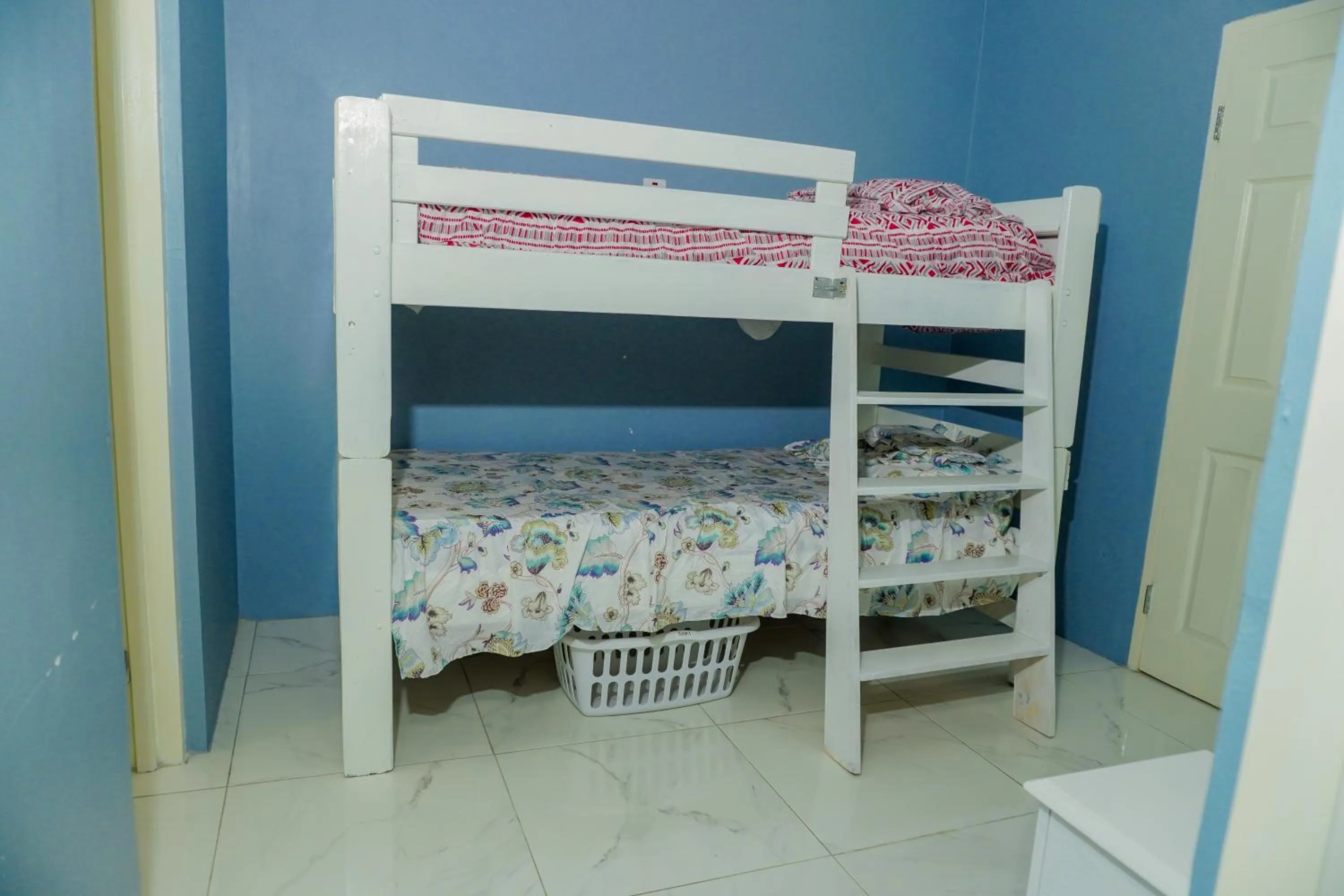 Bed in A taste of Jamaica Lavern’s Place