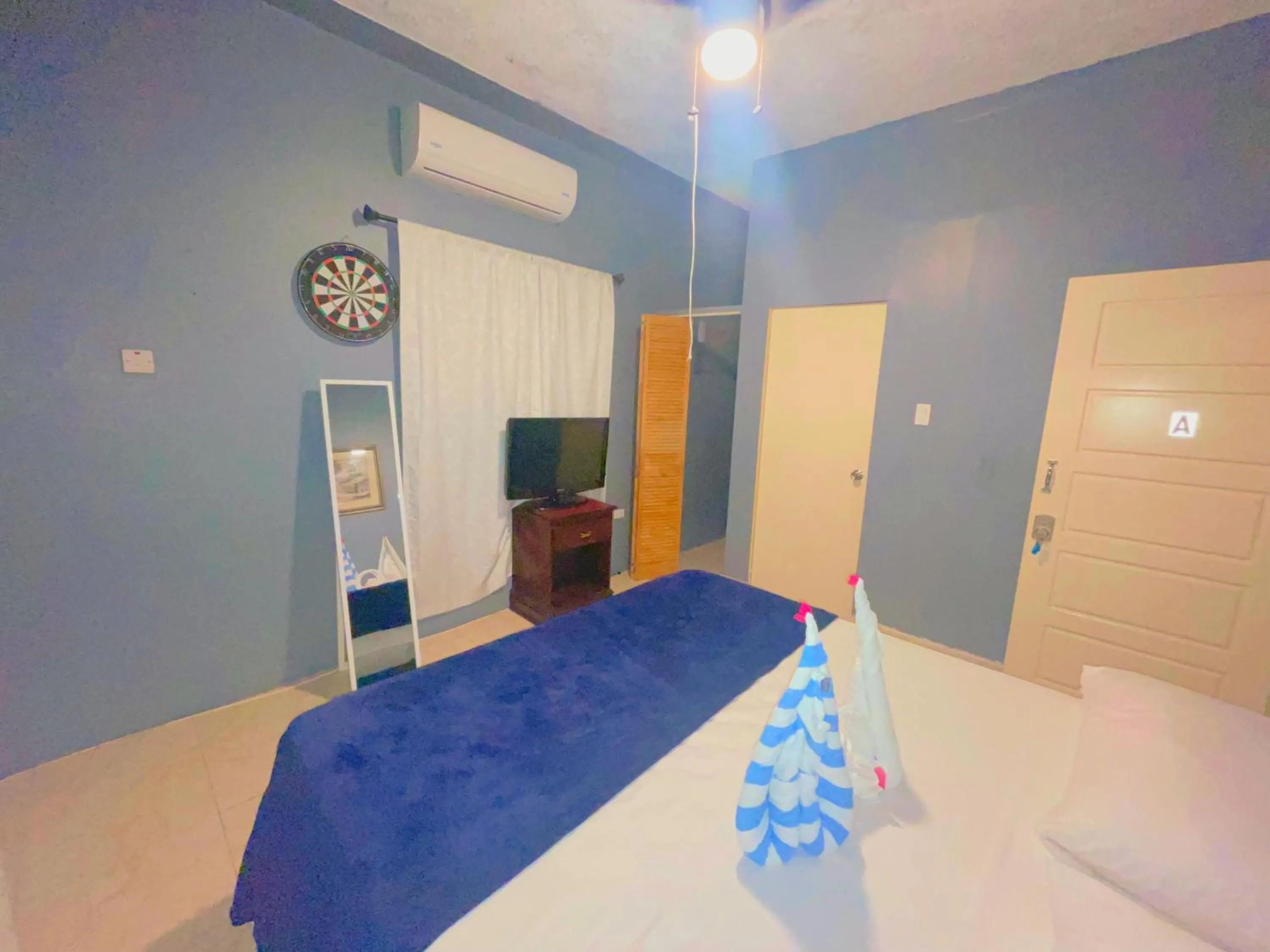 Bed in A taste of Jamaica Lavern’s Place