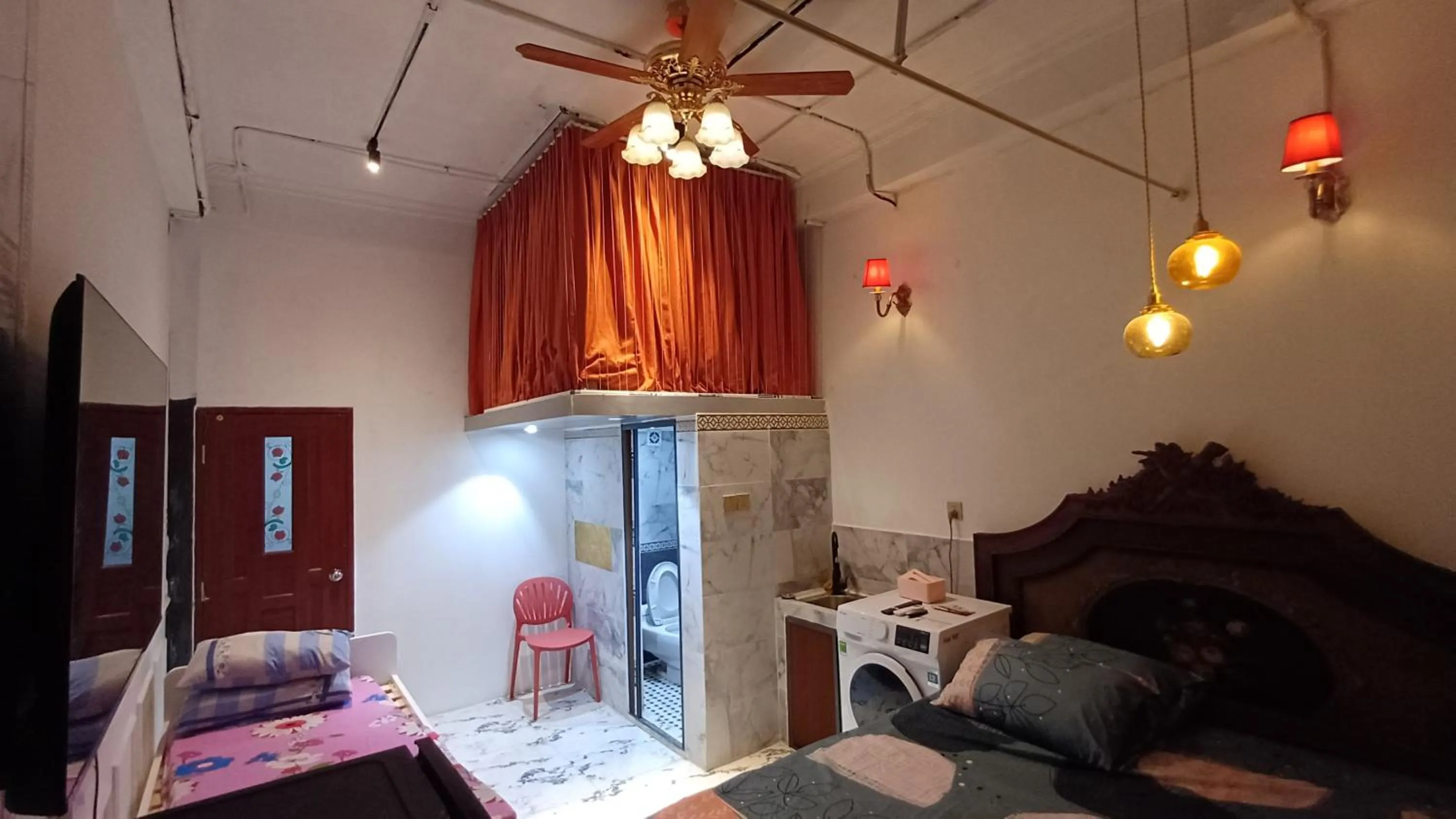 Communal lounge/ TV room in Homestay Hostel Apartment Minh Lộc