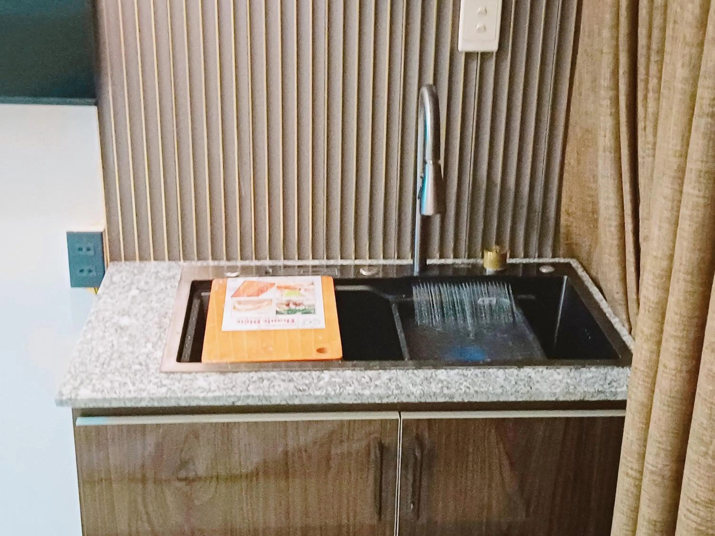 Kitchen or kitchenette in Homestay Hostel Apartment Minh Lộc