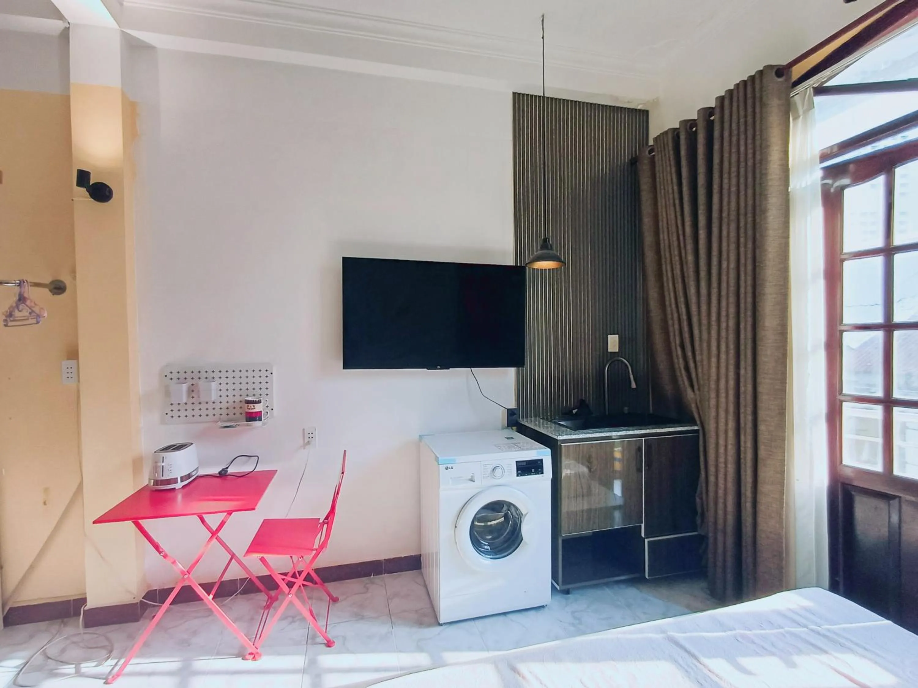 Communal lounge/ TV room in Homestay Hostel Apartment Minh Lộc
