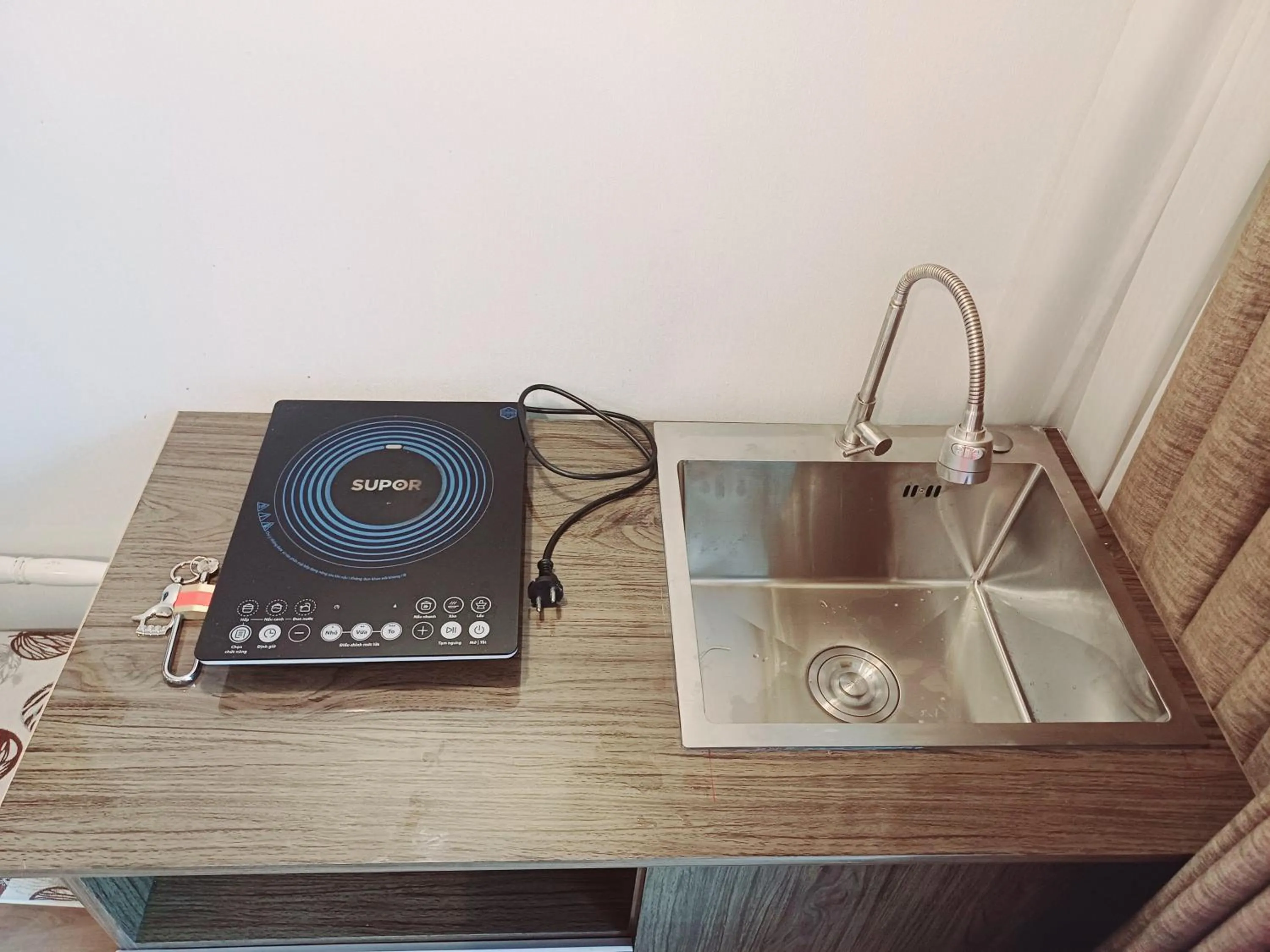 Kitchen or kitchenette in Homestay Hostel Apartment Minh Lộc