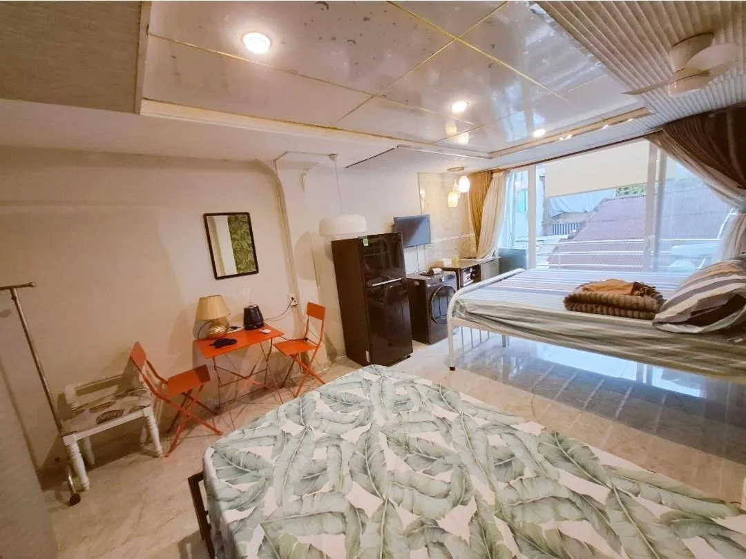 TV and multimedia, Bed in Homestay Hostel Apartment Minh Lộc