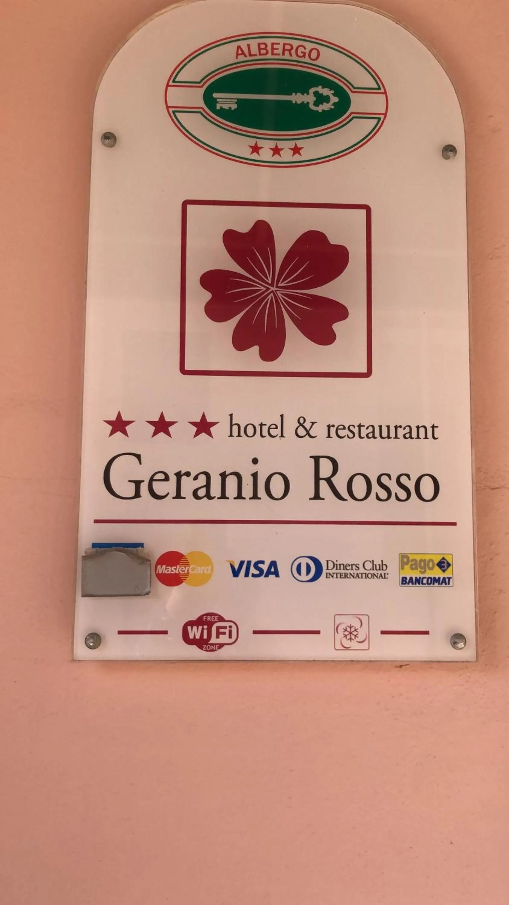 Property logo or sign in Hotel Geranio Rosso