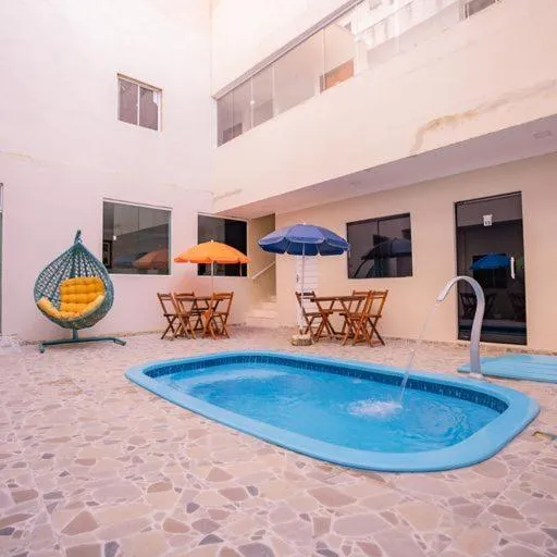 Swimming pool in Pousada Villa Costeira