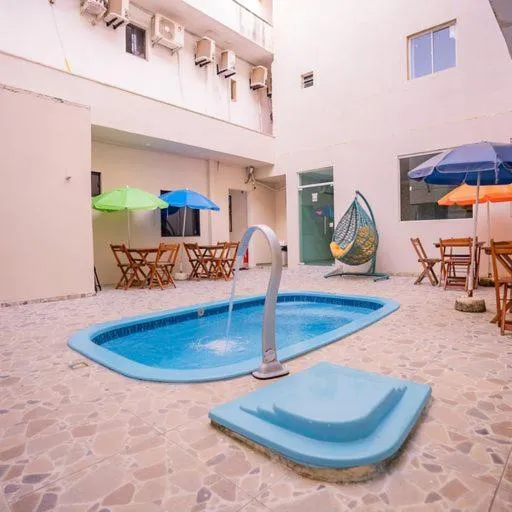Swimming pool in Pousada Villa Costeira