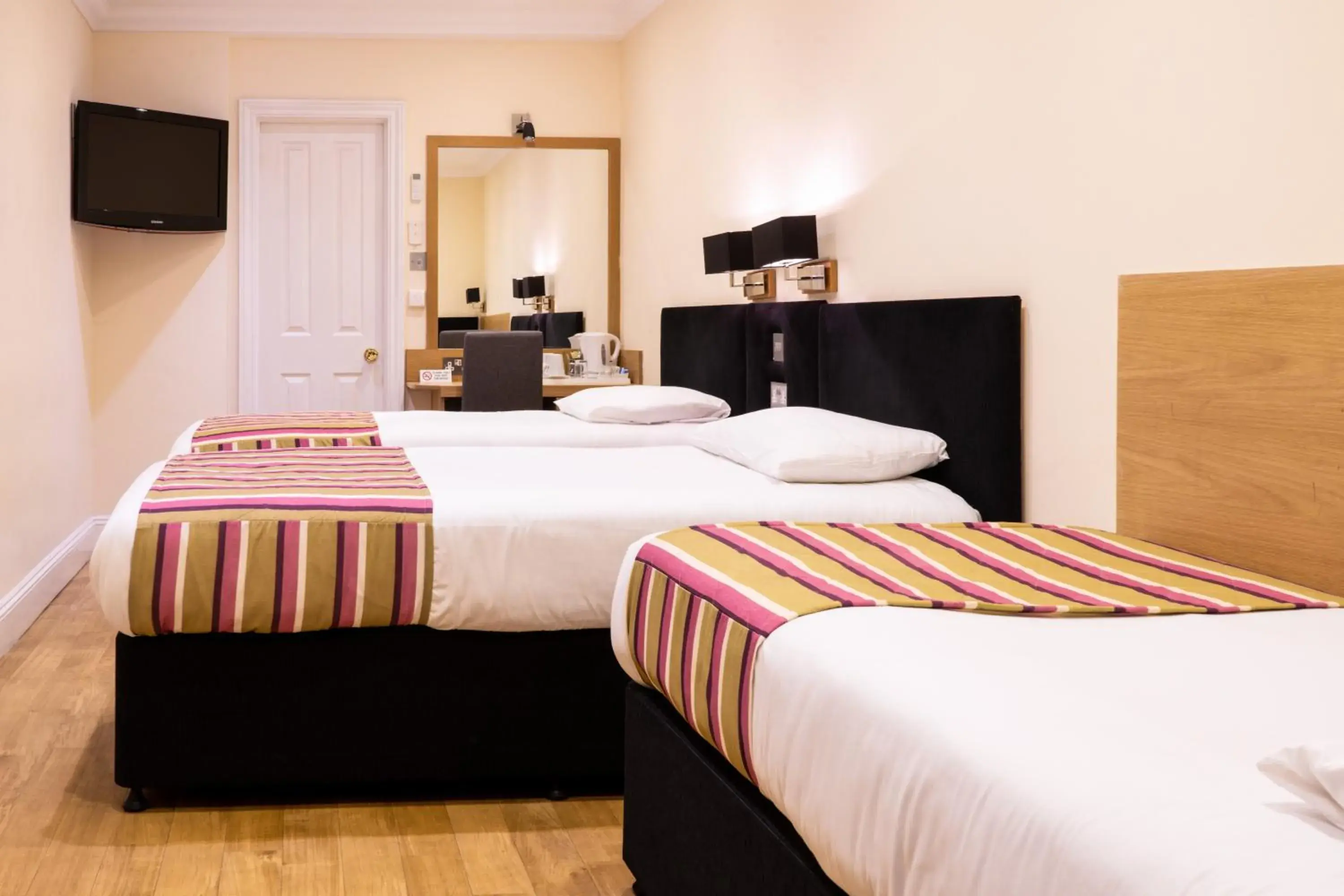 Bed in Athena Hotel Bed in Athena Hotel