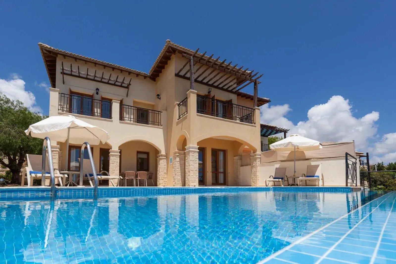 Property building in Aphrodite Hills Rentals - Junior Villas Property building in Aphrodite Hills Rentals - Junior Villas