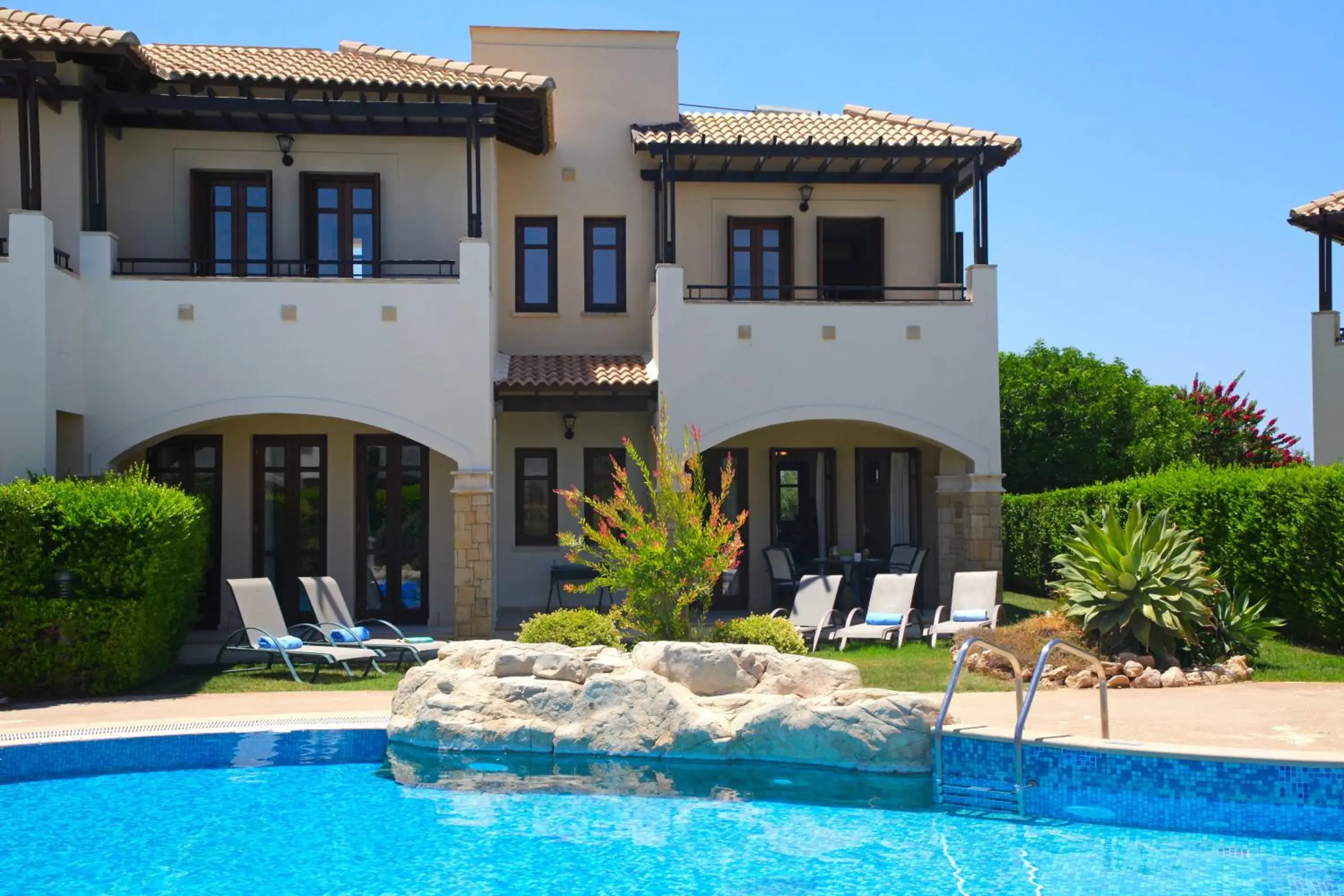 Property building in Aphrodite Hills Rentals - Junior Villas Property building in Aphrodite Hills Rentals - Junior Villas