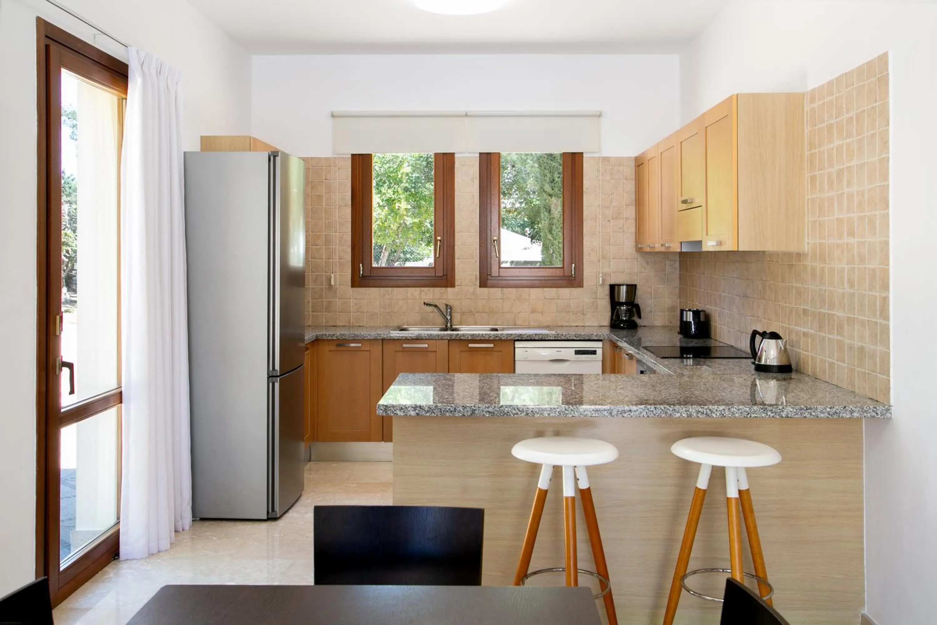 Kitchen or kitchenette in Aphrodite Hills Rentals - Superior Villas