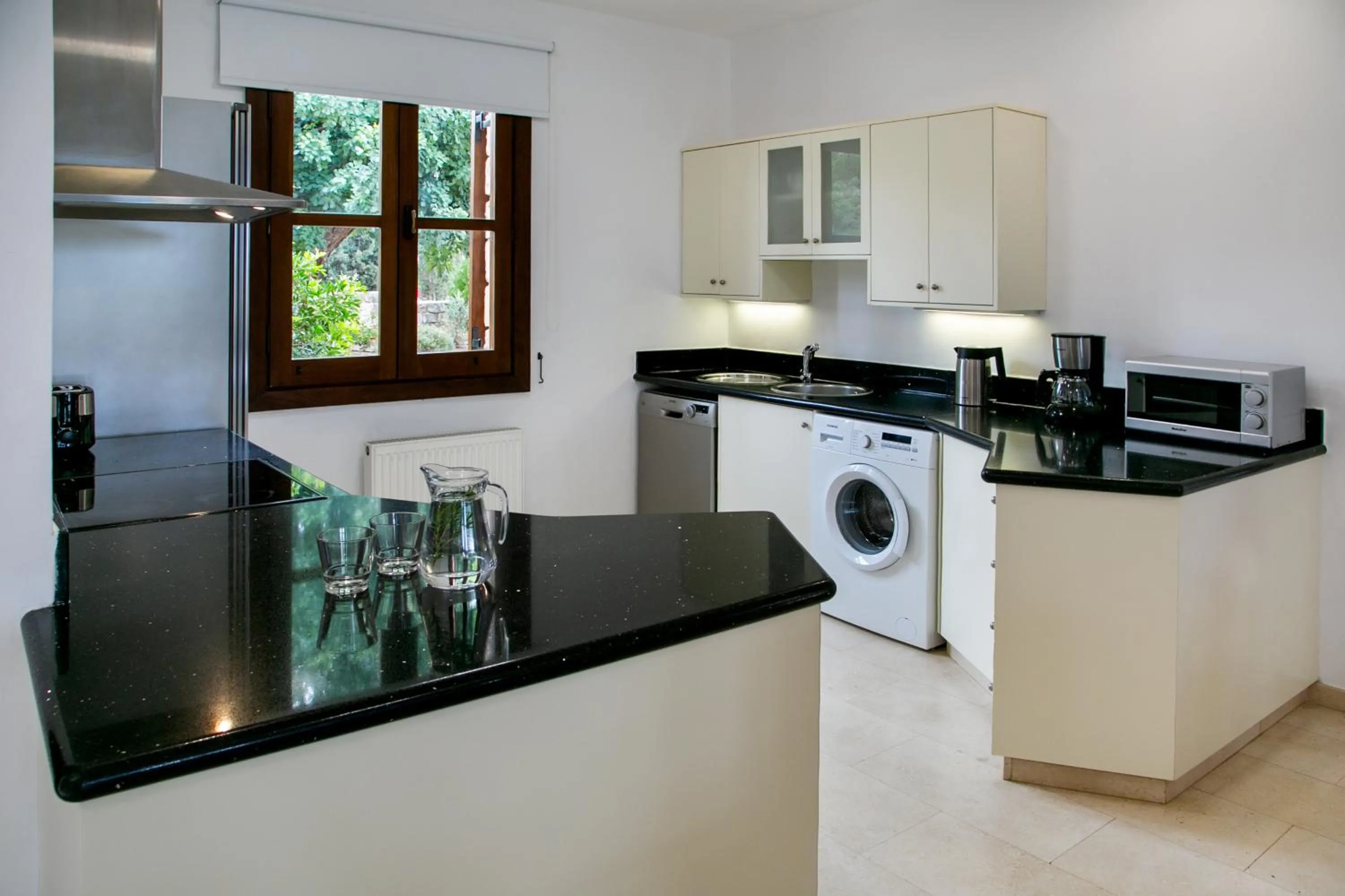 Kitchen or kitchenette in Aphrodite Hills Rentals - Superior Villas