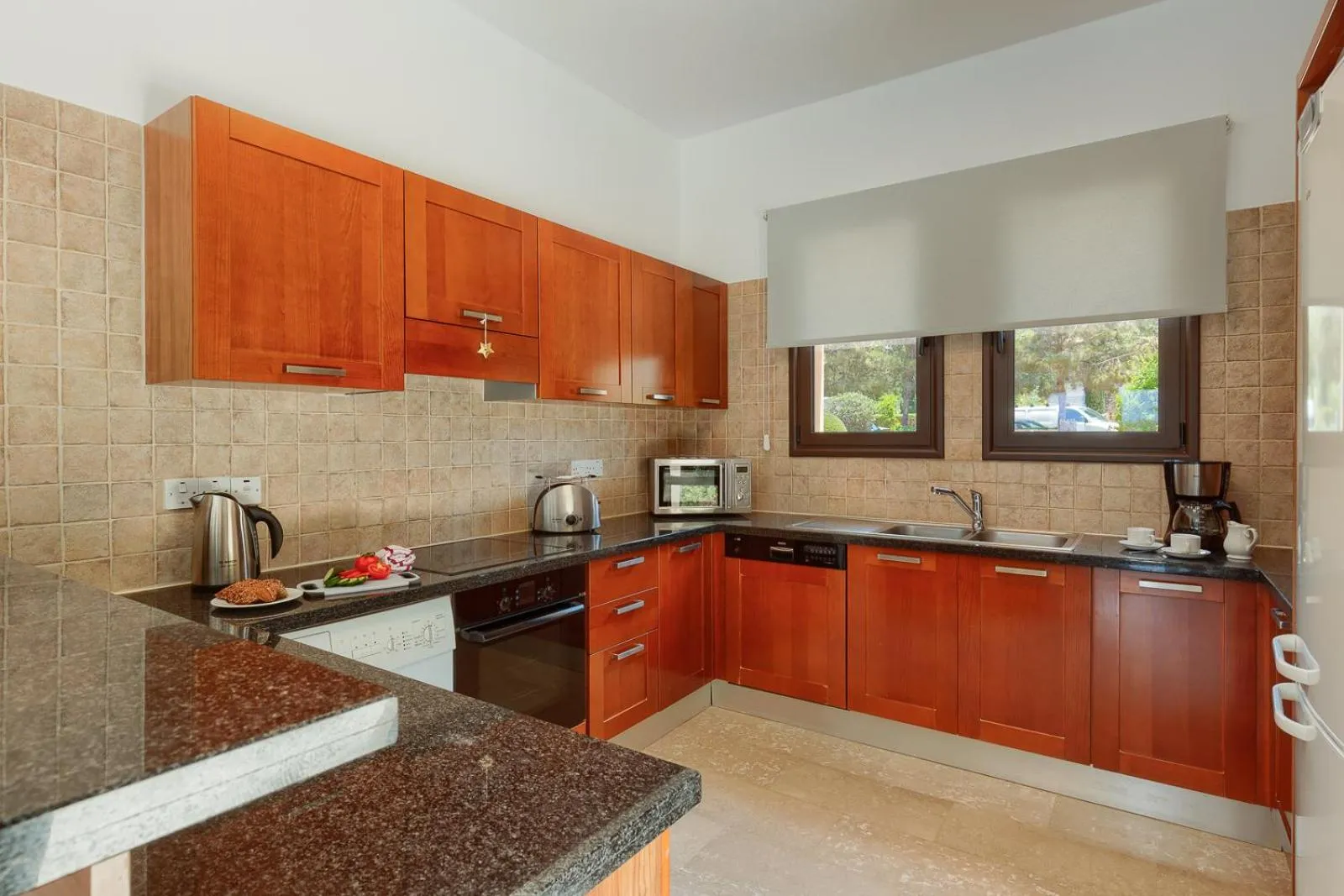 Kitchen or kitchenette in Aphrodite Hills Rentals - Superior Villas
