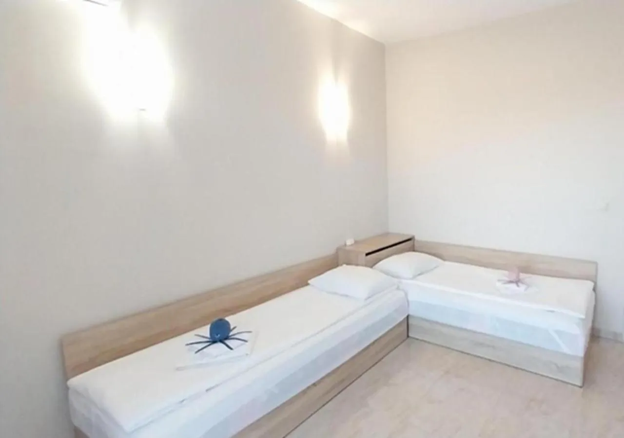 Bed in Sea Dreams Apartment