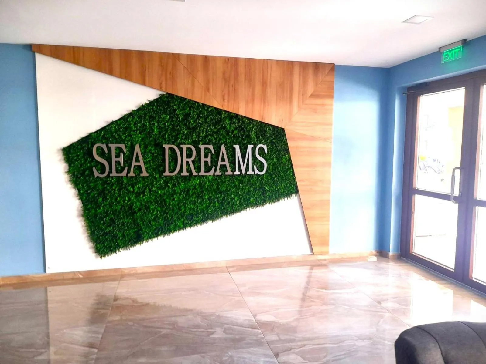 Property logo or sign in Sea Dreams Apartment