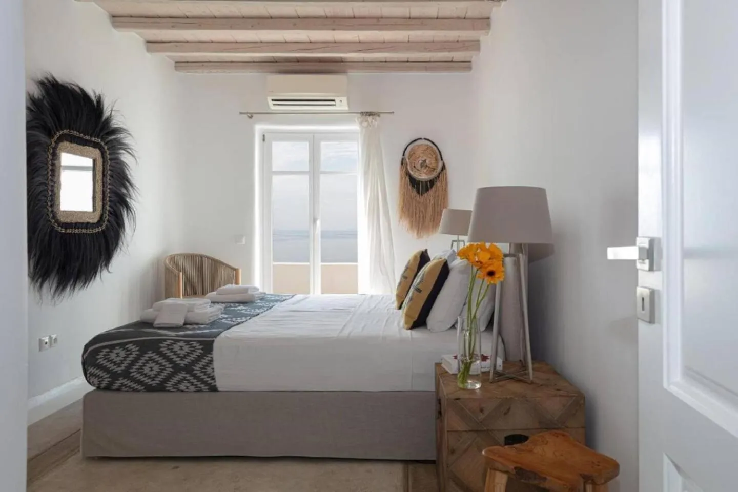 Bed in White Rock Suites & Villas