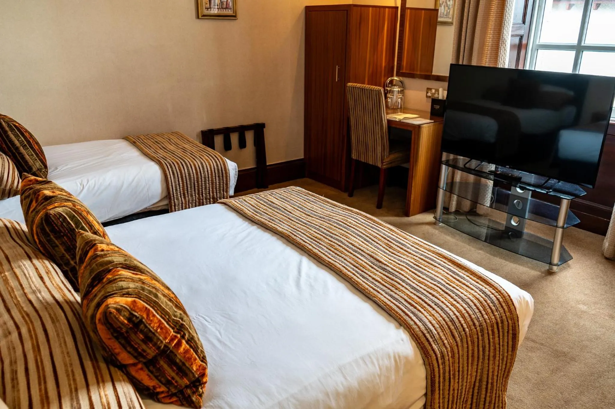 Bed in The Mansefield Hotel