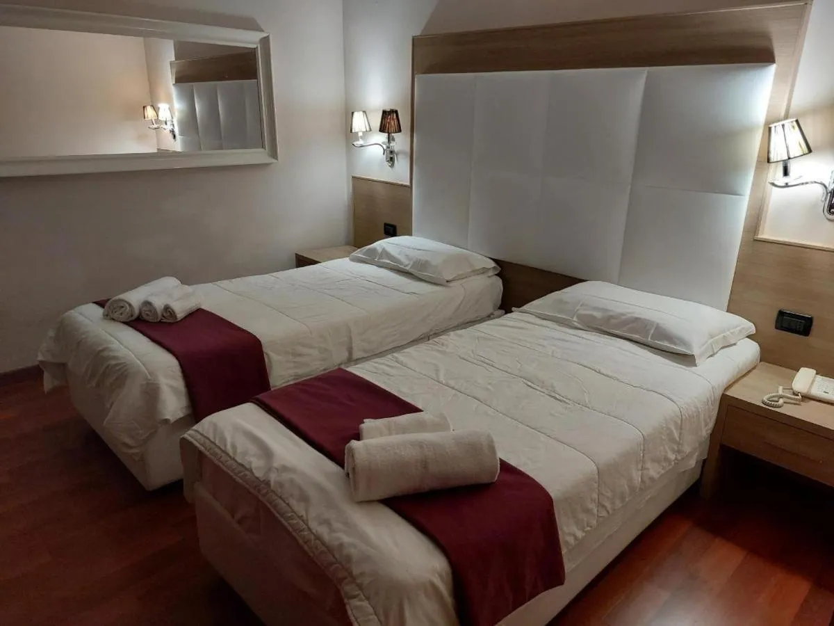 Bedroom, Bed in Momi's Hotel